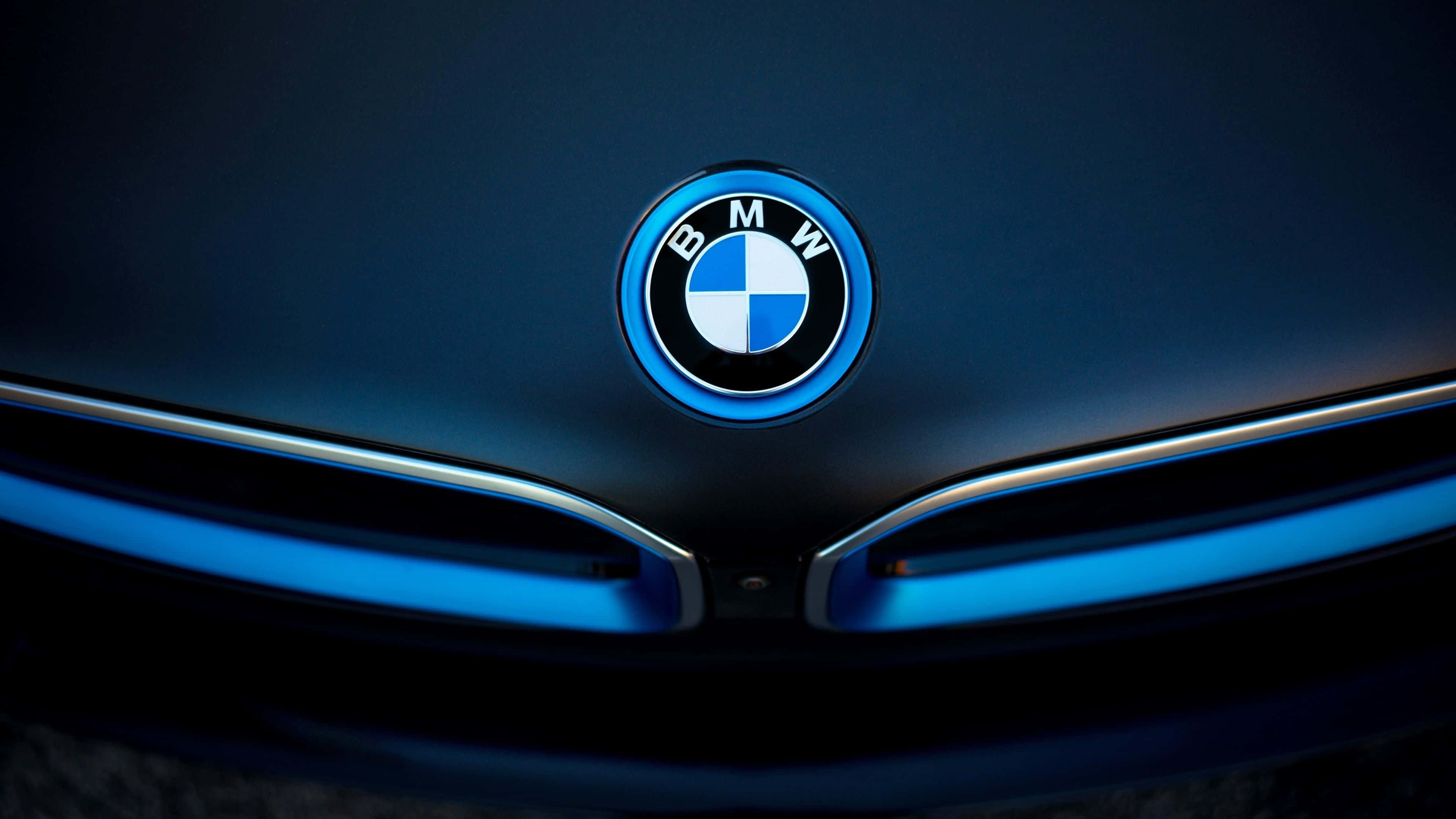 BMW Logo, glowing blue, sleek dark car hood, 4K Desktop Wallpaper