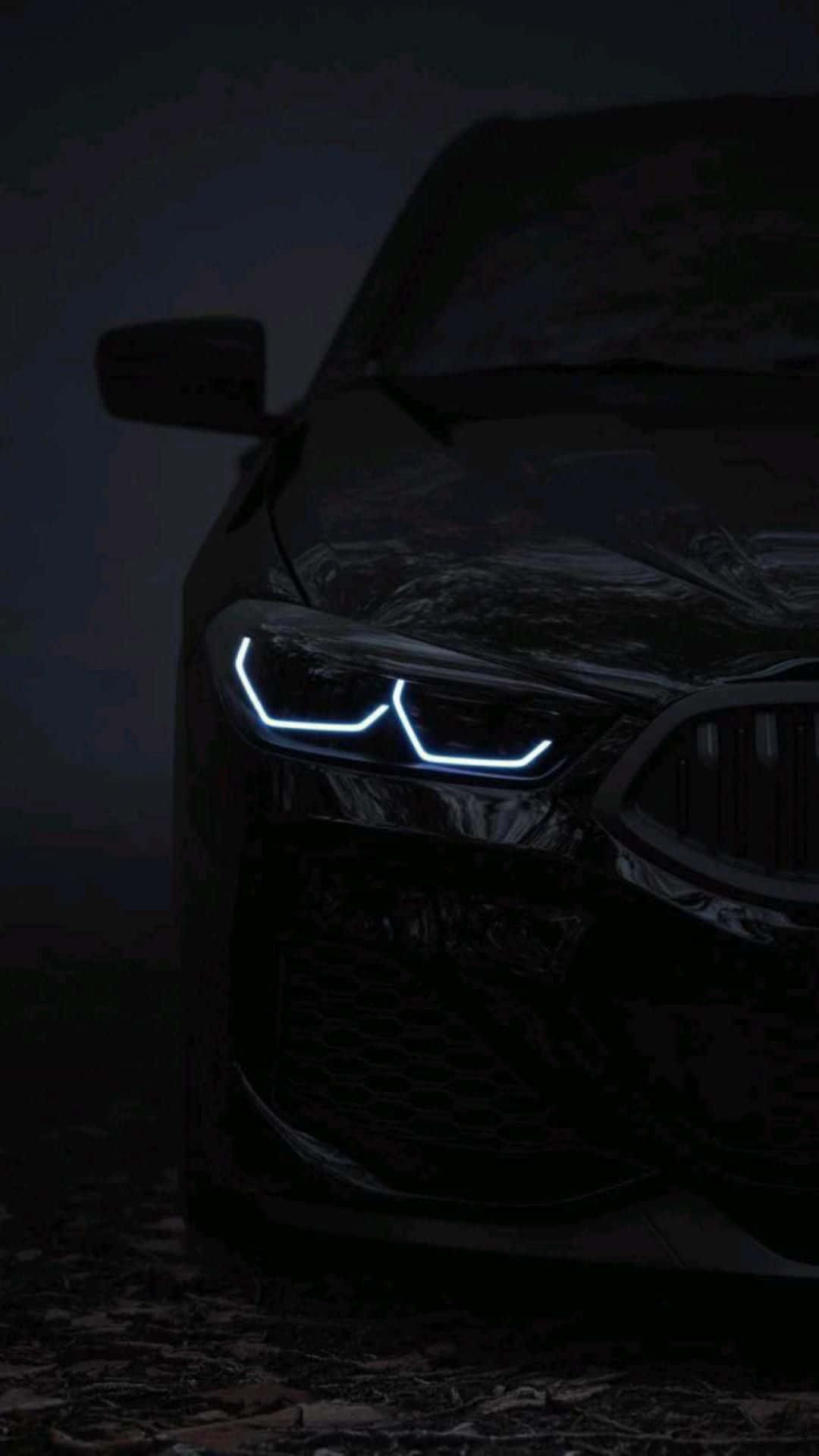 BMW M5, black, glowing blue headlights, Full HD Phone Wallpaper
