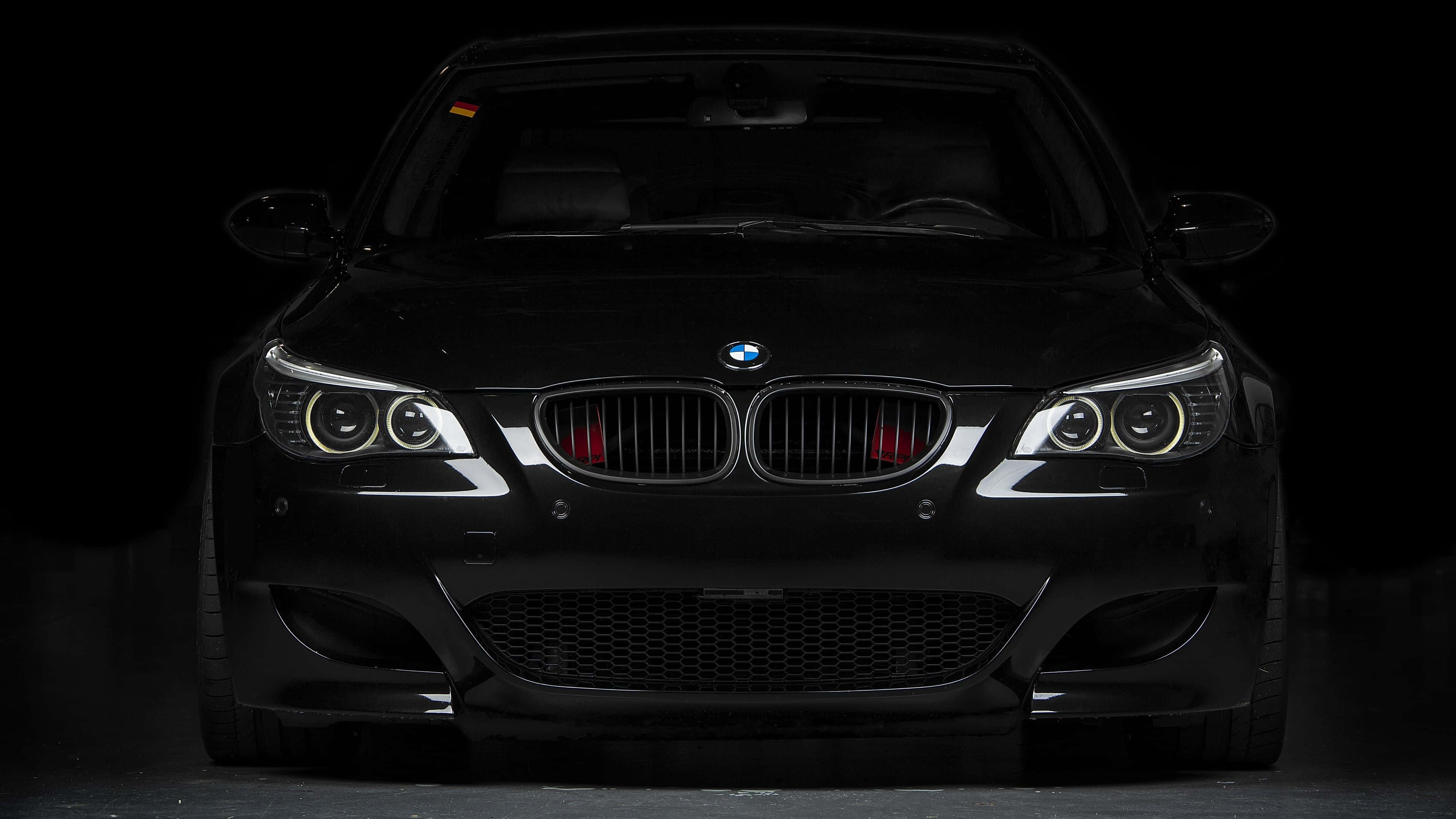 BMW M5, black, illuminated headlights, 4K Desktop Wallpaper