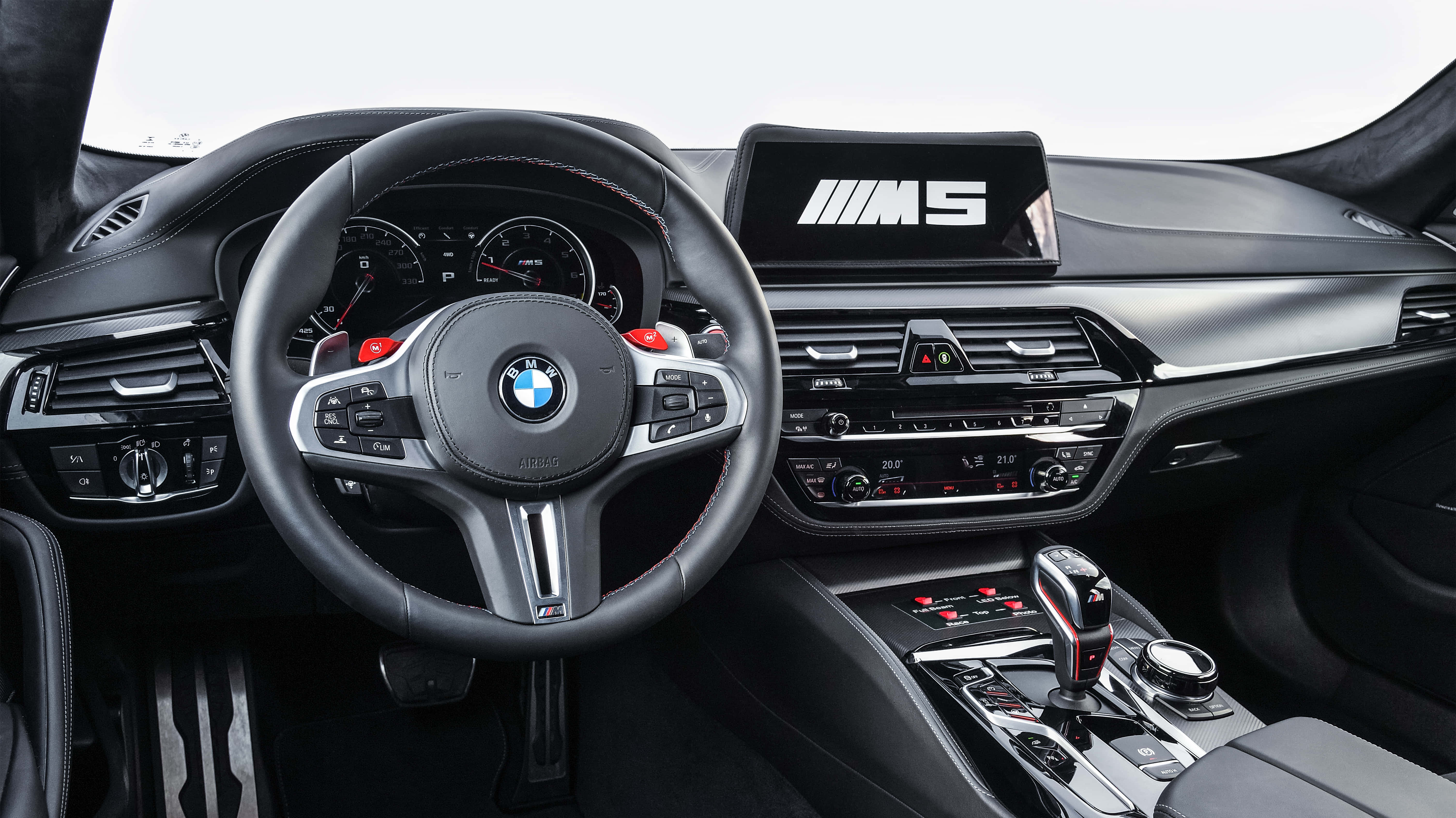 BMW M5, black leather steering wheel, red accents, 5K Desktop Wallpaper