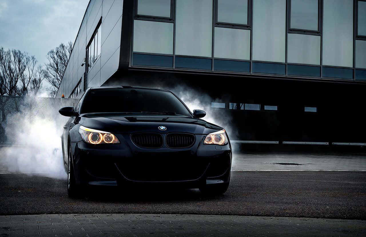 BMW M5, black, drifts with smoke billowing from its tires, HD Desktop Wallpaper