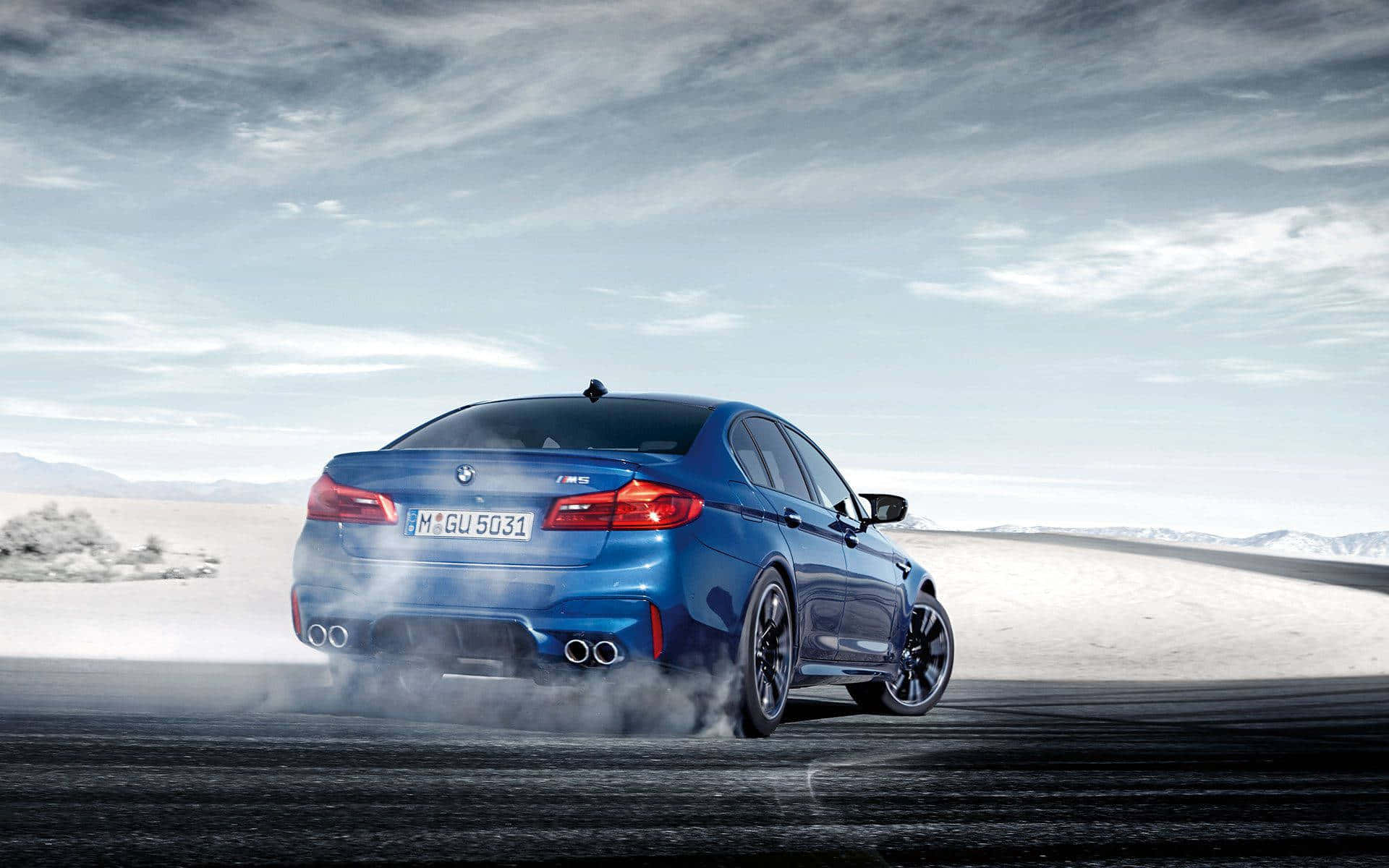 BMW M5, vibrant blue, drifts with smoke billowing from its tires, Full HD Desktop Wallpaper