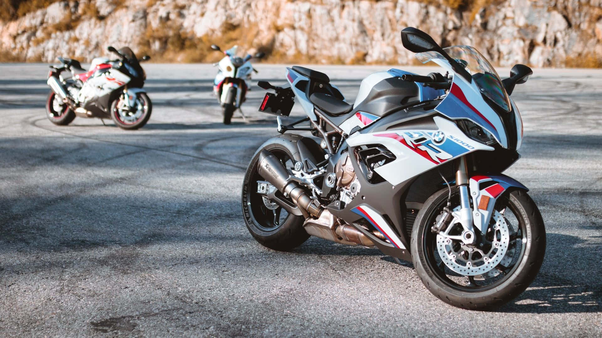 BMW S1000RR, white red and blue livery, sunlit asphalt track, Full HD Desktop Wallpaper
