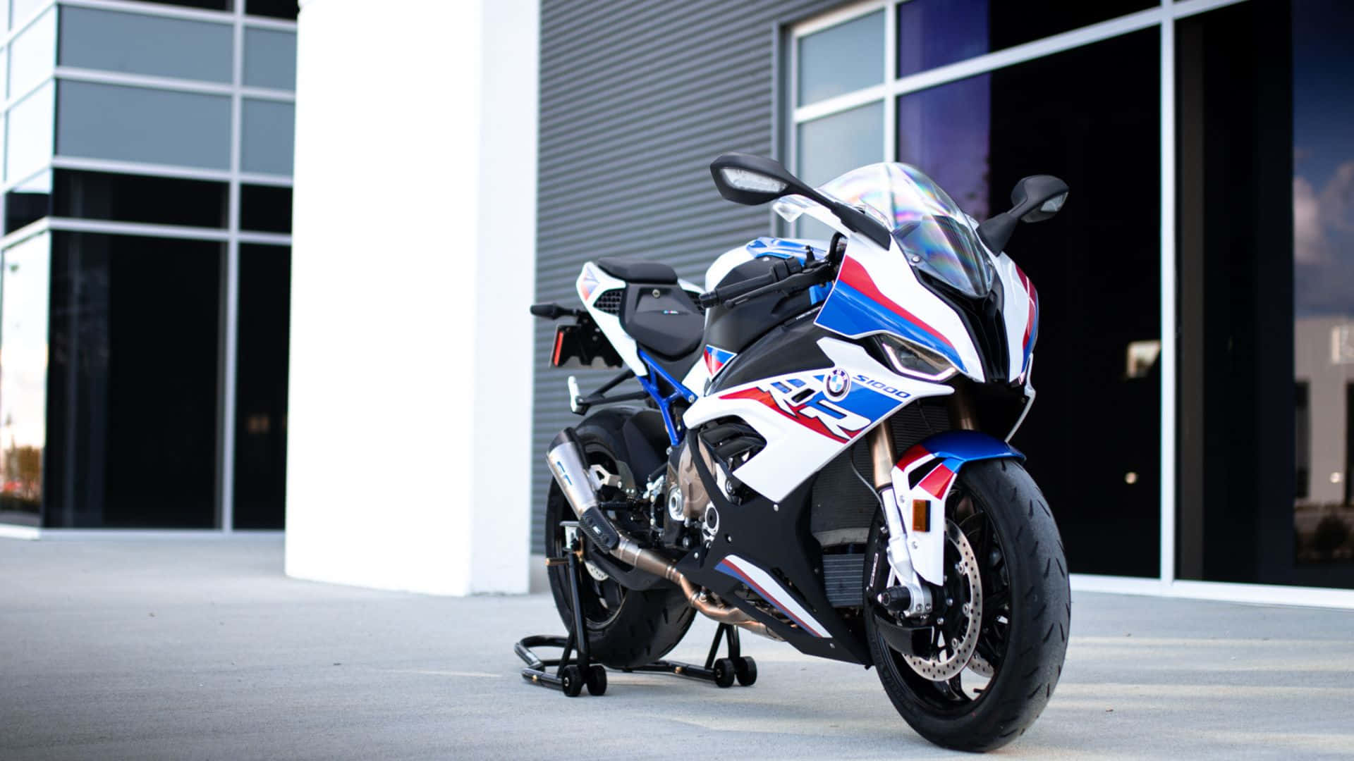 BMW S1000RR, white blue and red, modern glass and metal building, Full HD Desktop Wallpaper