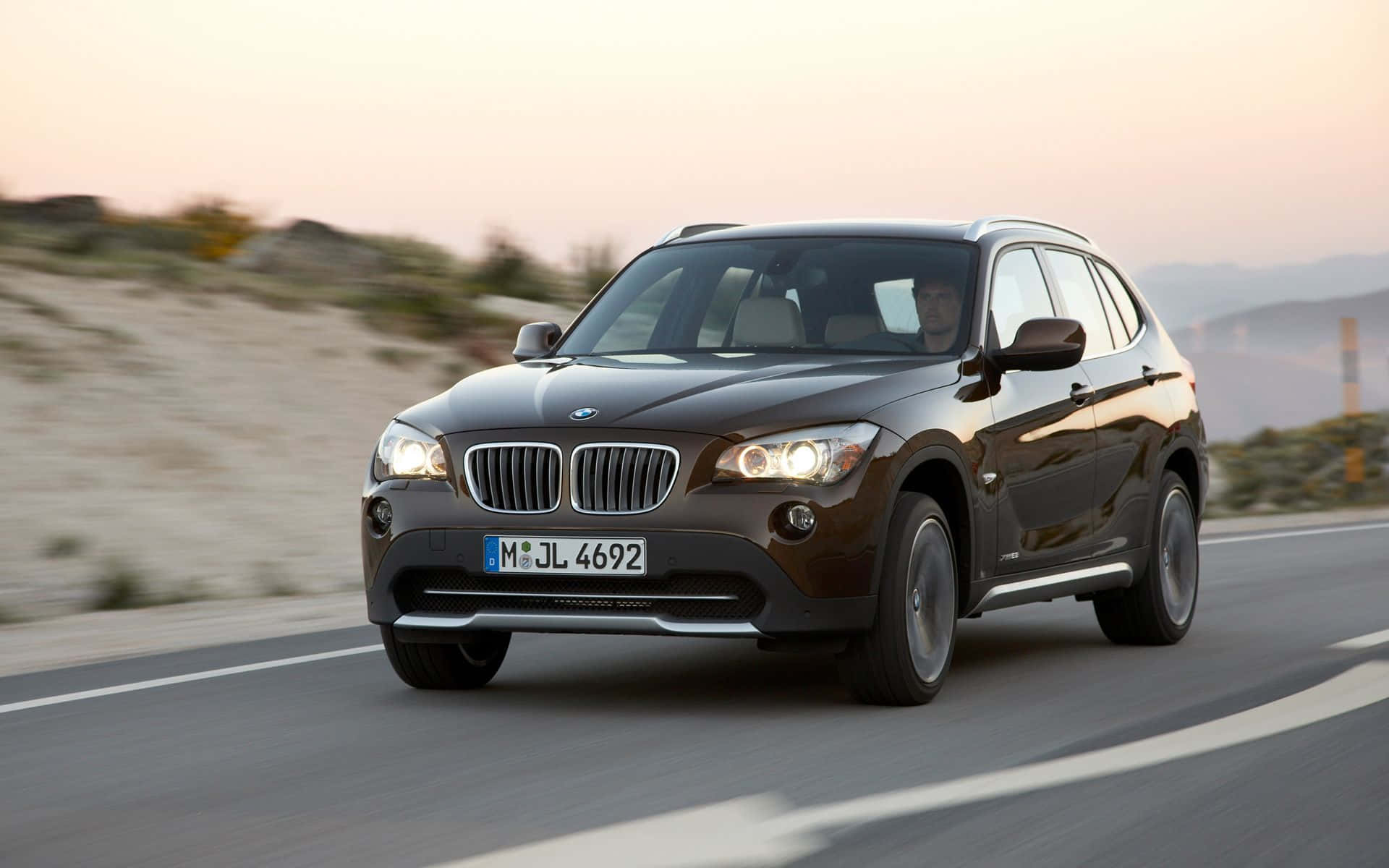 BMW X1, dark brown, coastal road, Full HD Desktop Wallpaper