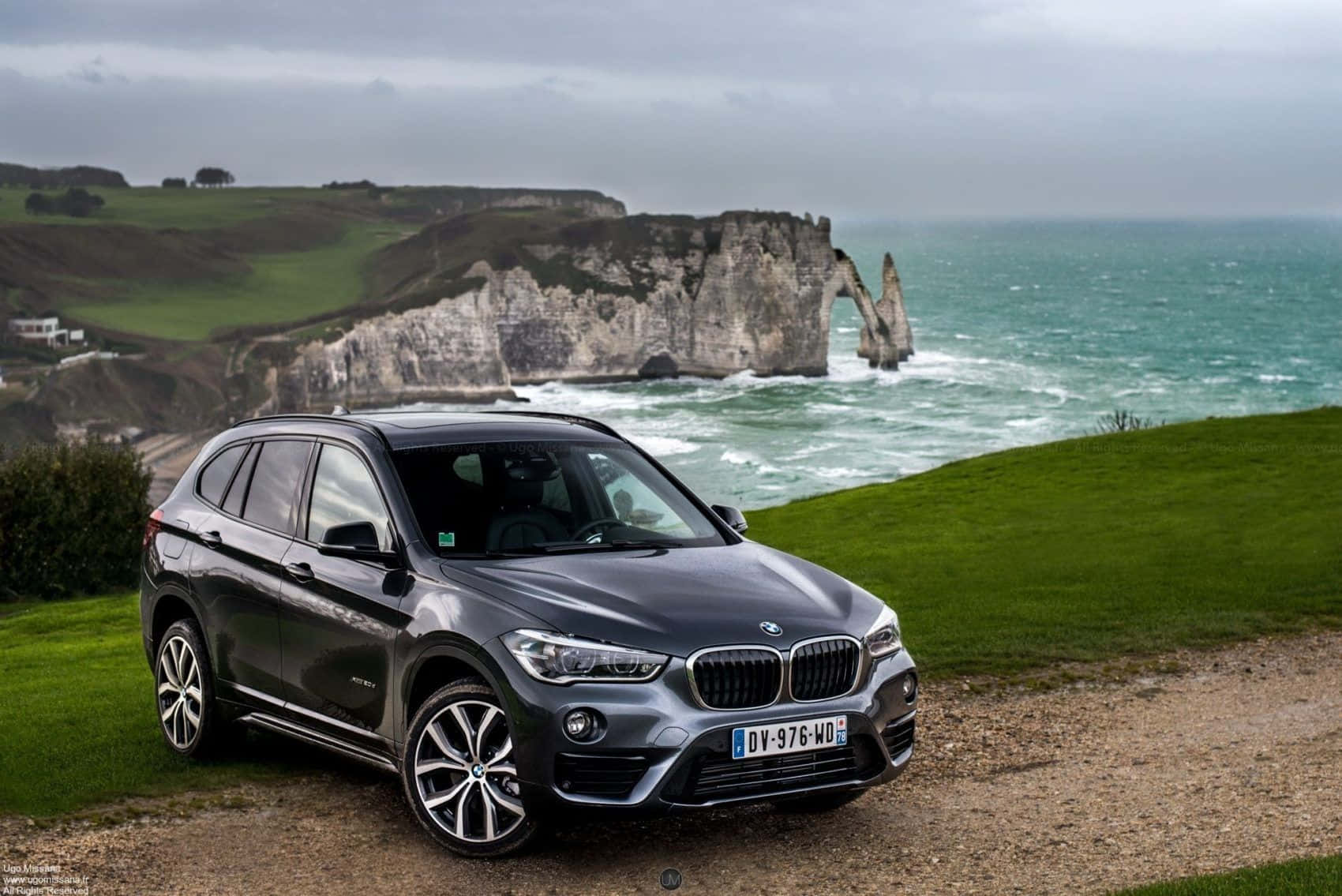 BMW X1, gray, grassy cliff, HD Desktop Wallpaper