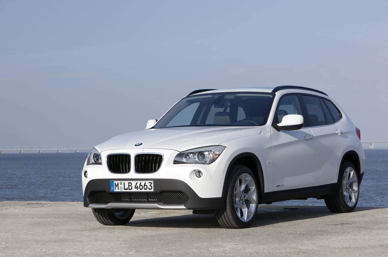 BMW X1, white, concrete pier, HD Desktop Wallpaper