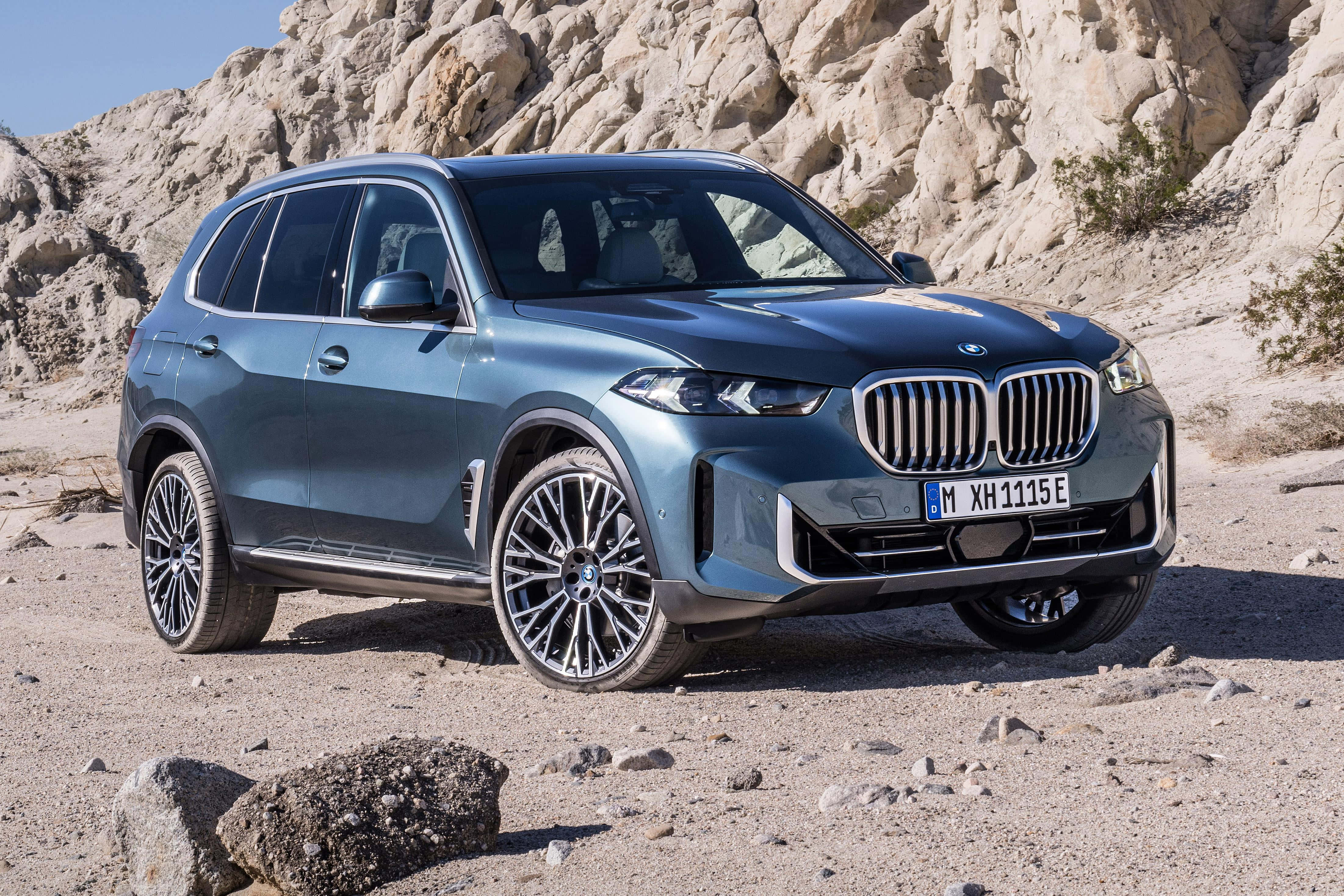 BMW X5, blue, rocky desert terrain, 4K Desktop Wallpaper