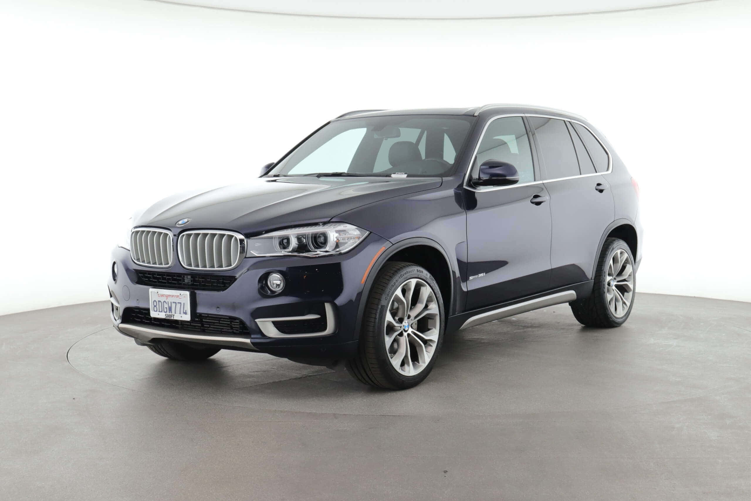 BMW X5, dark blue, minimalist studio, 2K Desktop Wallpaper