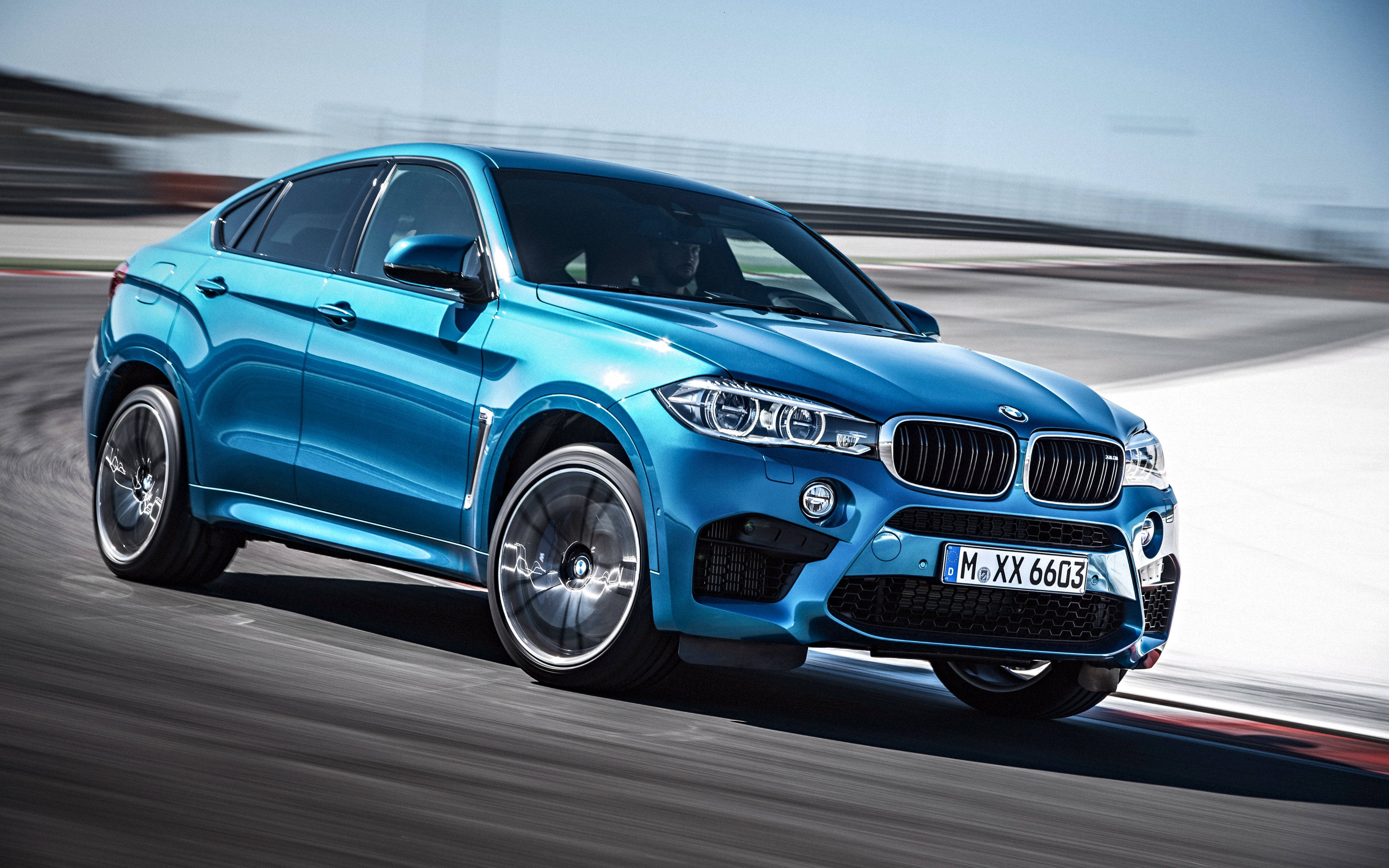BMW X6 M, vibrant blue, racetrack, 4K Desktop Wallpaper