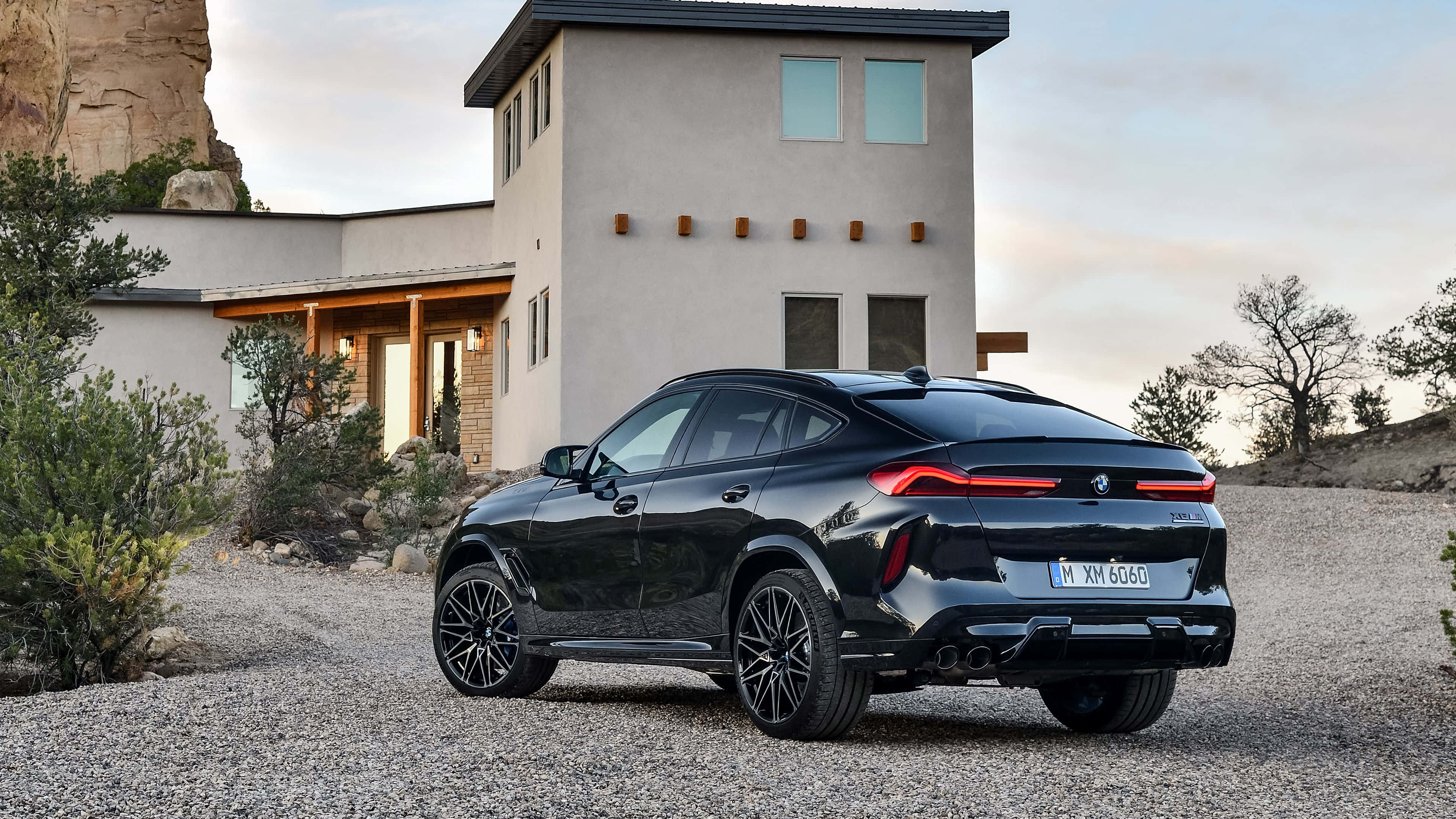 BMW X6 M, sleek black, gravel, 4K Desktop Wallpaper