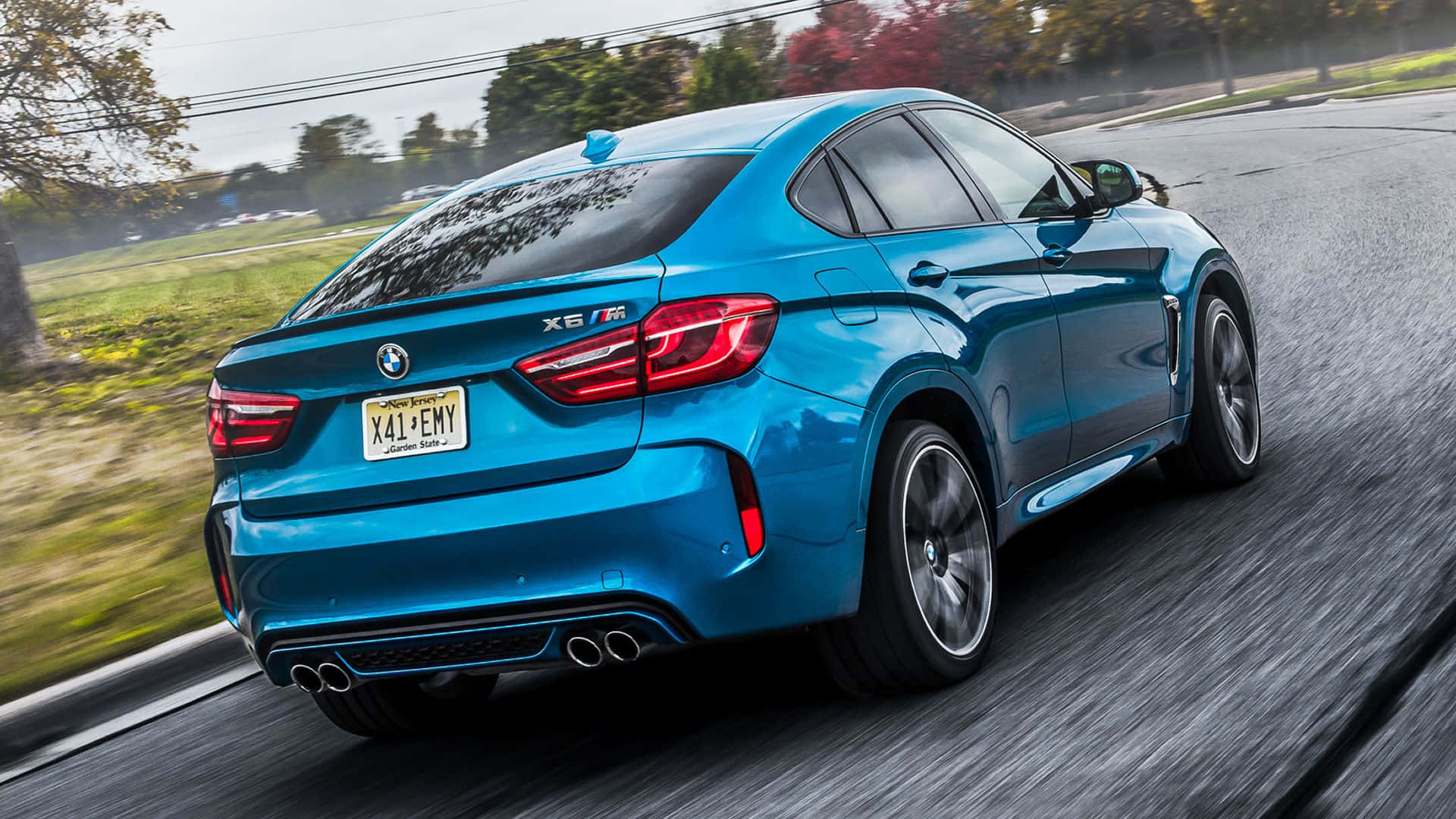 BMW X6 M, vibrant blue, wet road, Full HD Desktop Wallpaper