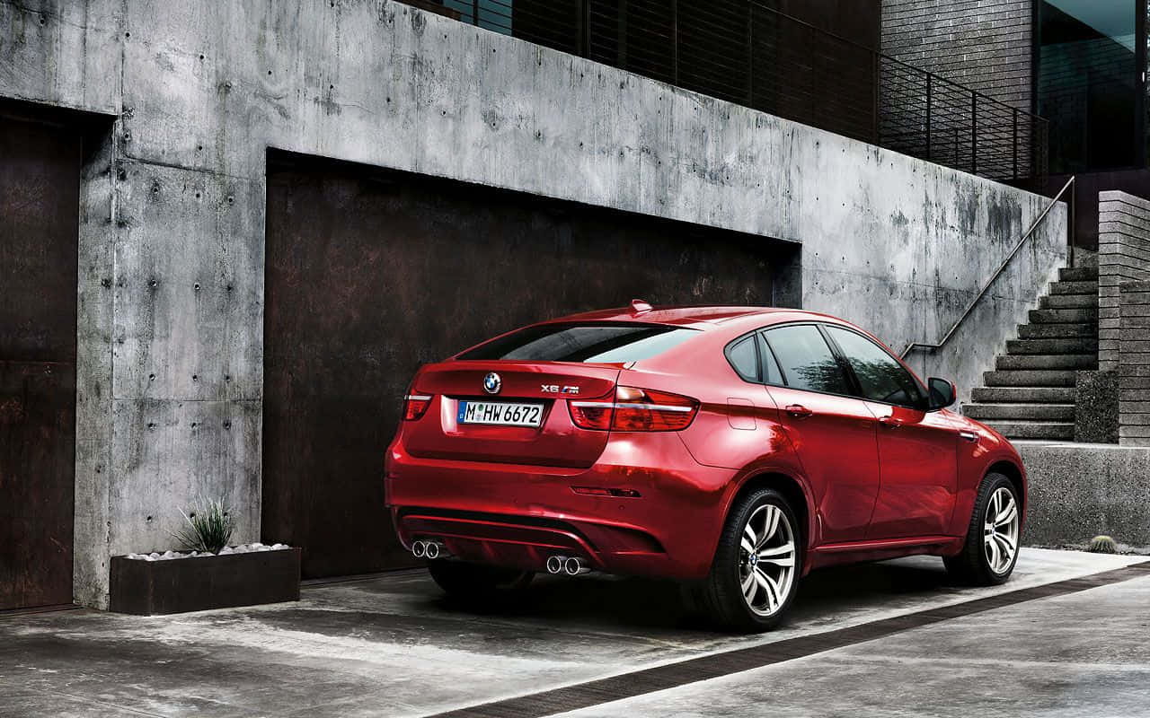 BMW X6, glossy red, concrete wall, HD Desktop Wallpaper