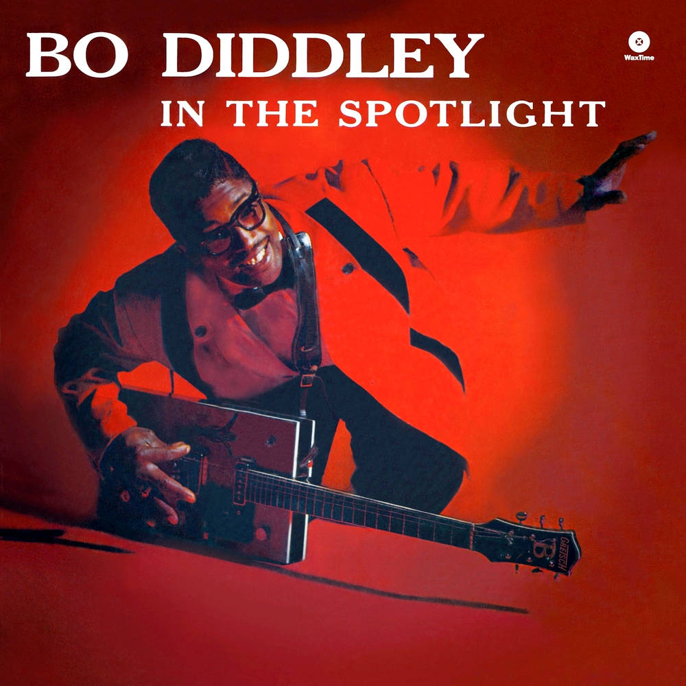 Bo Diddley, signature electric guitar, dramatic red spotlight, SD Desktop Wallpaper