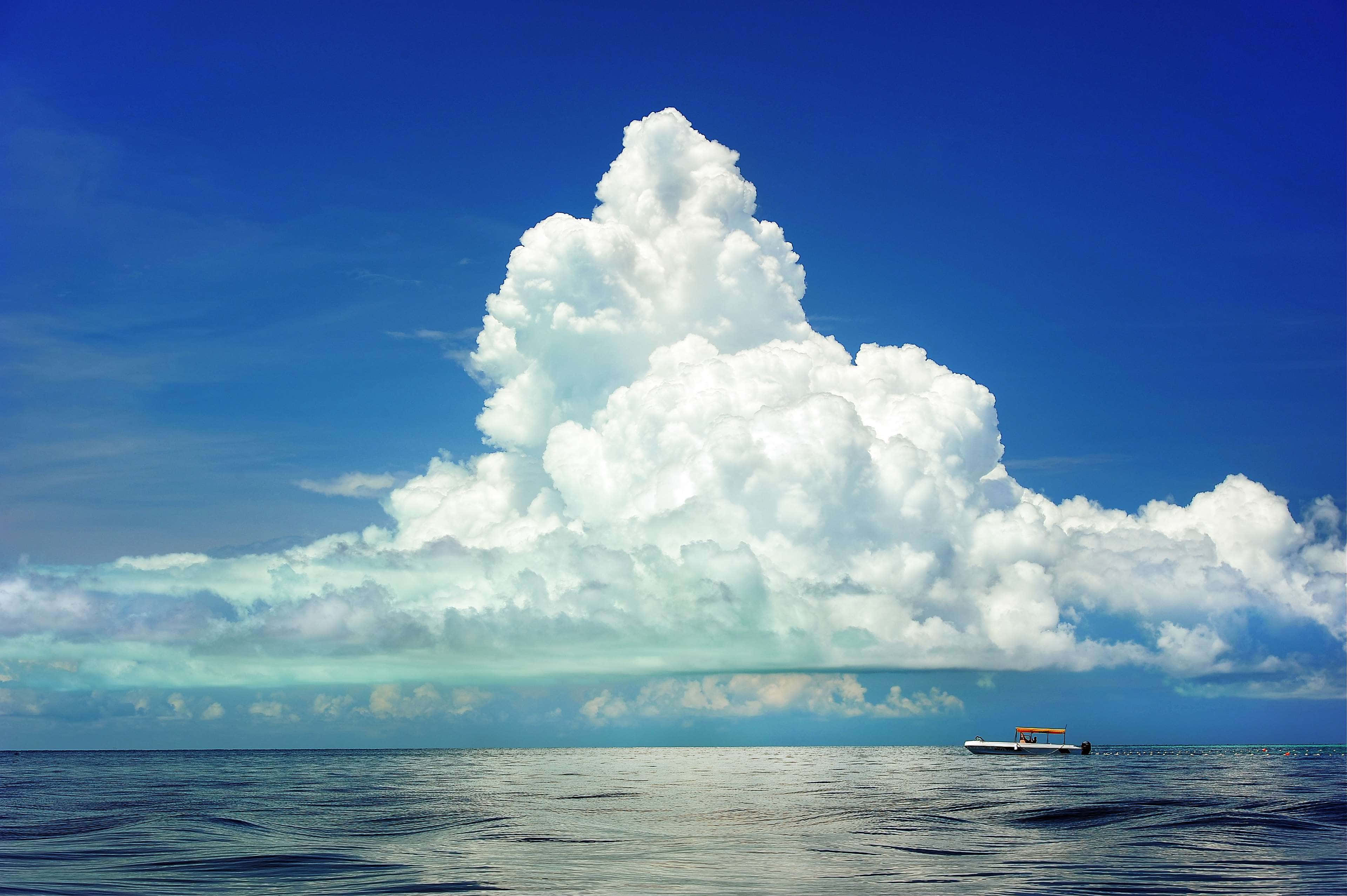 calm ocean waters, massive fluffy white cloud, vivid blue sky, 4K Desktop Wallpaper