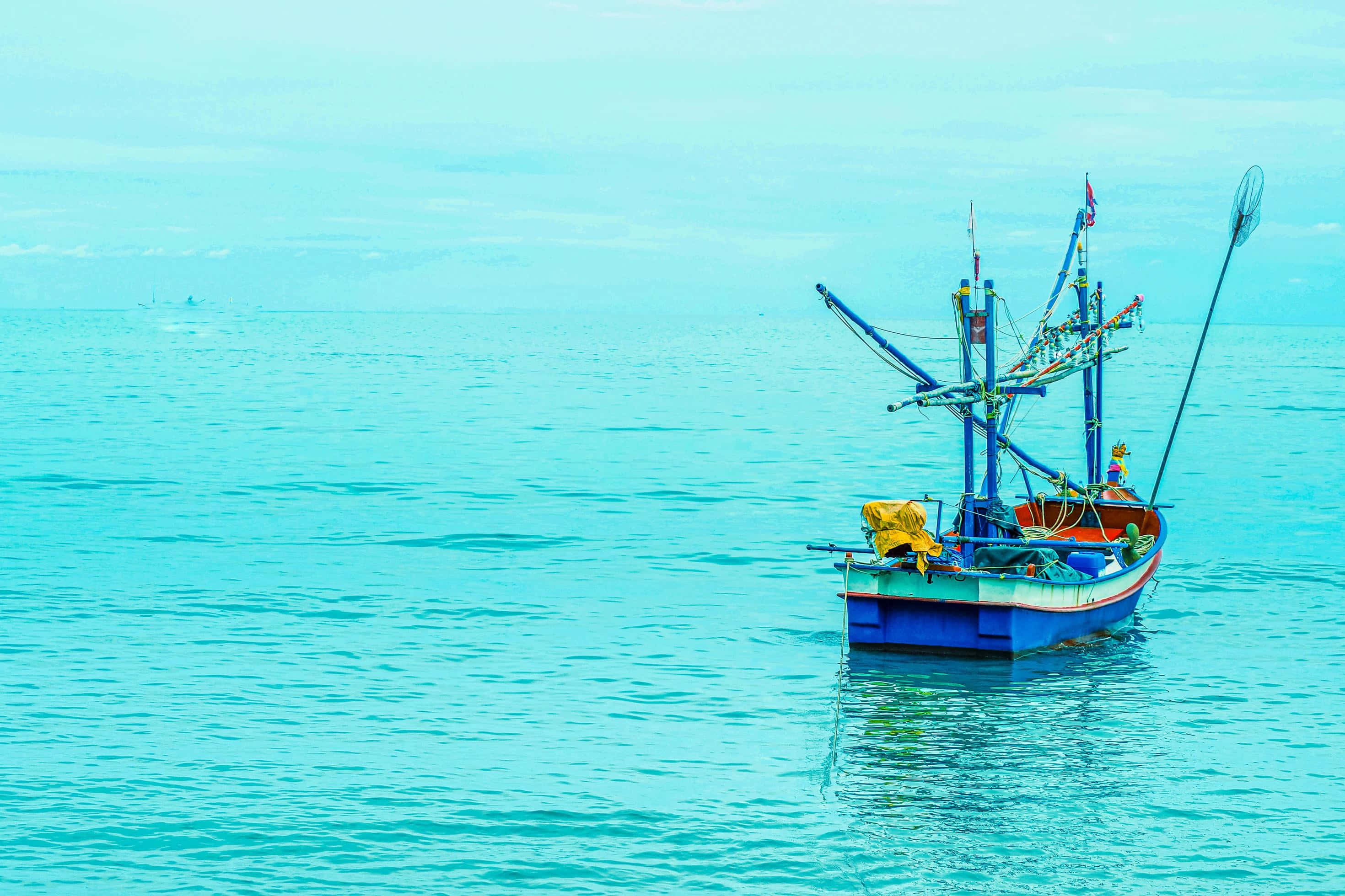 fishing boat, calm turquoise waters, hazy sky, 2K Desktop Wallpaper