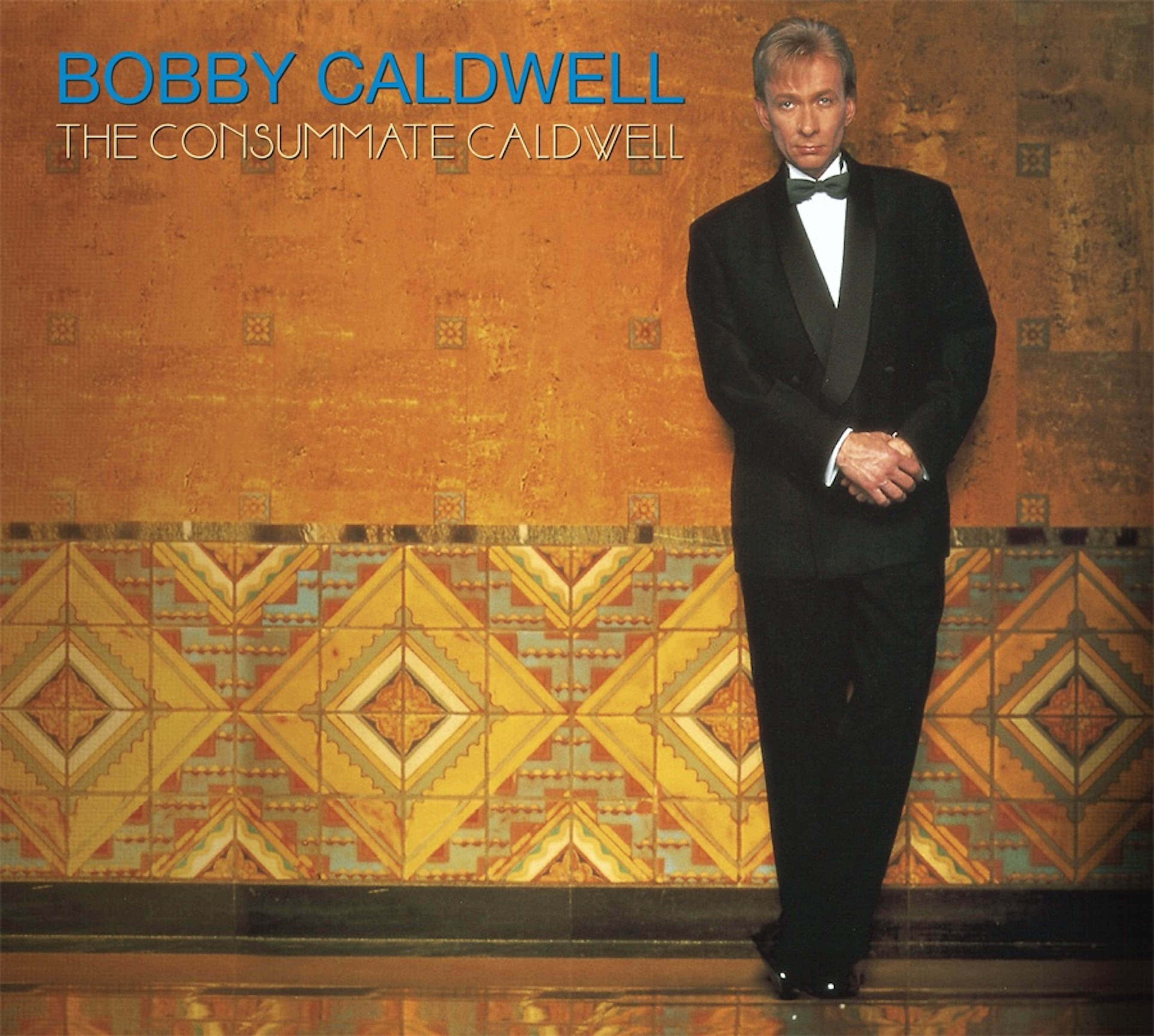 Bobby Caldwell, black tuxedo, warm textured wall, 4K Desktop Wallpaper