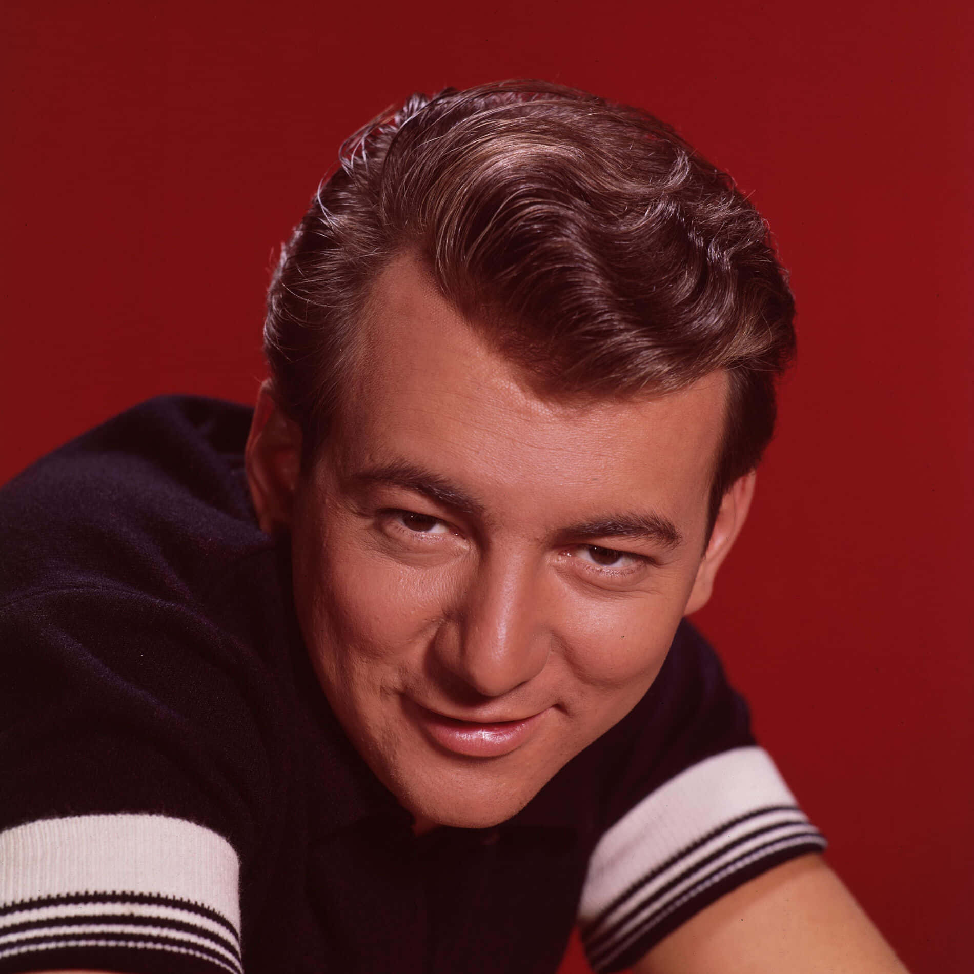Bobby Darin, solid red background, dark sweater, HD Desktop Wallpaper