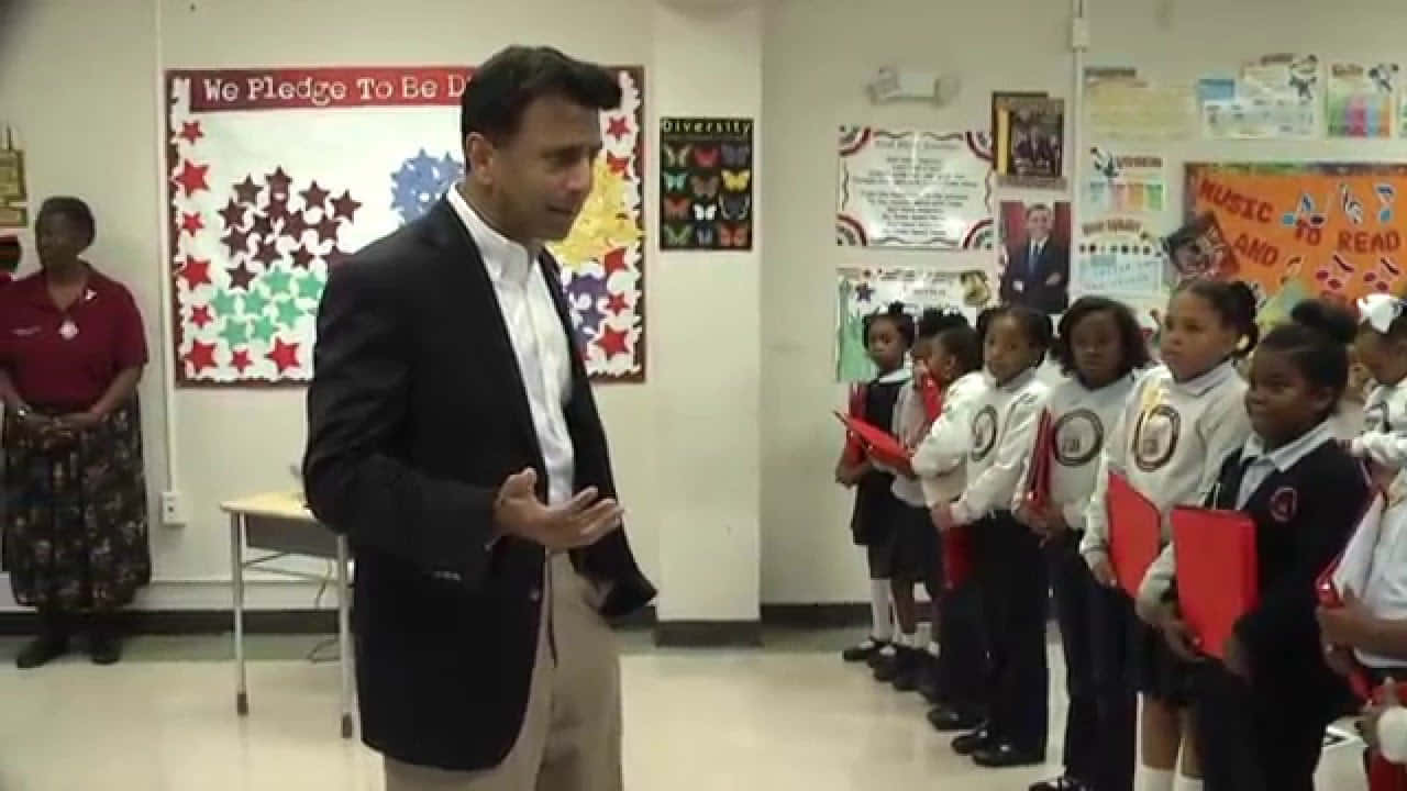 Bobby Jindal, suit, red folders, HD Desktop Wallpaper