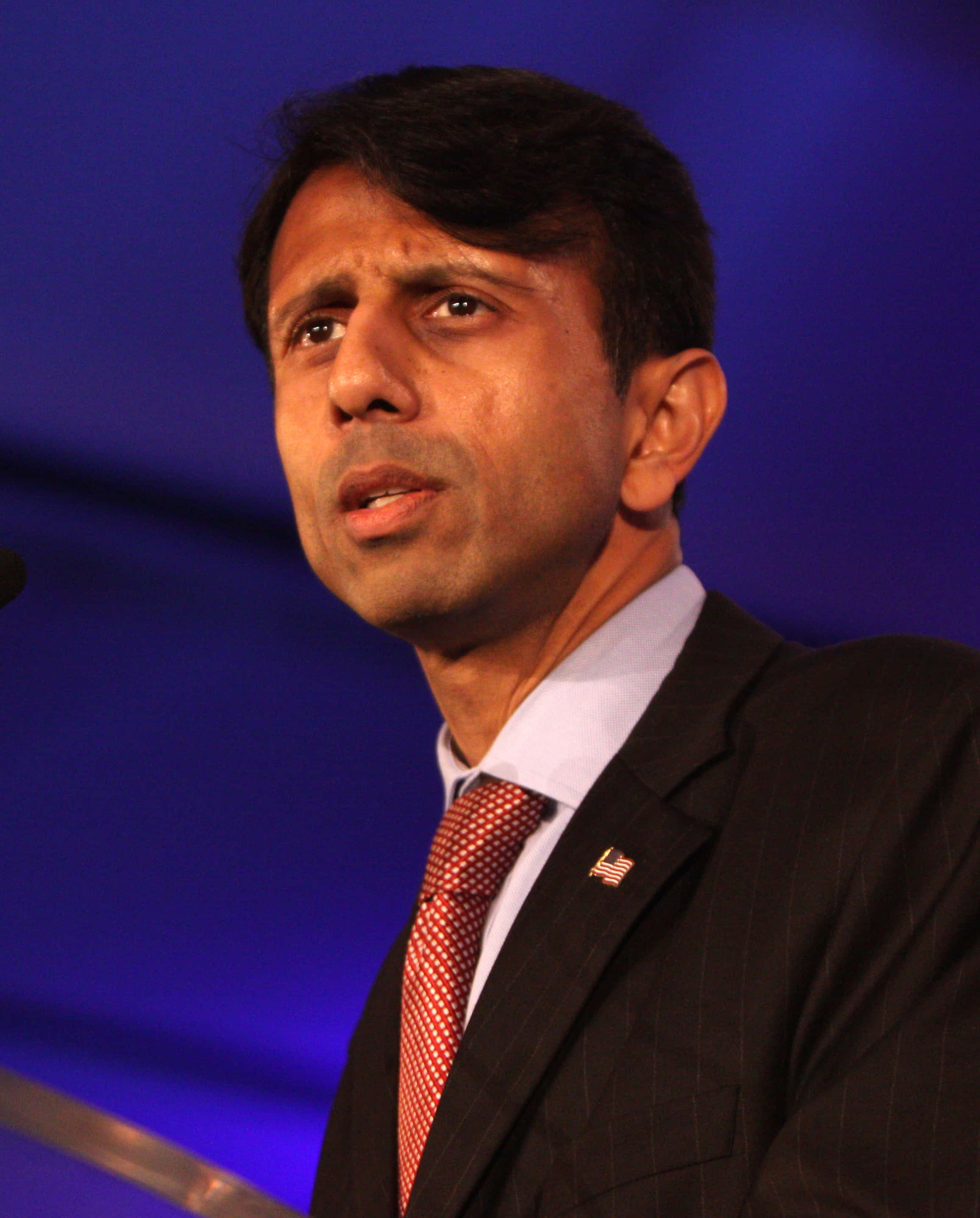 Bobby Jindal, dark suit, red patterned tie, 2K Phone Wallpaper