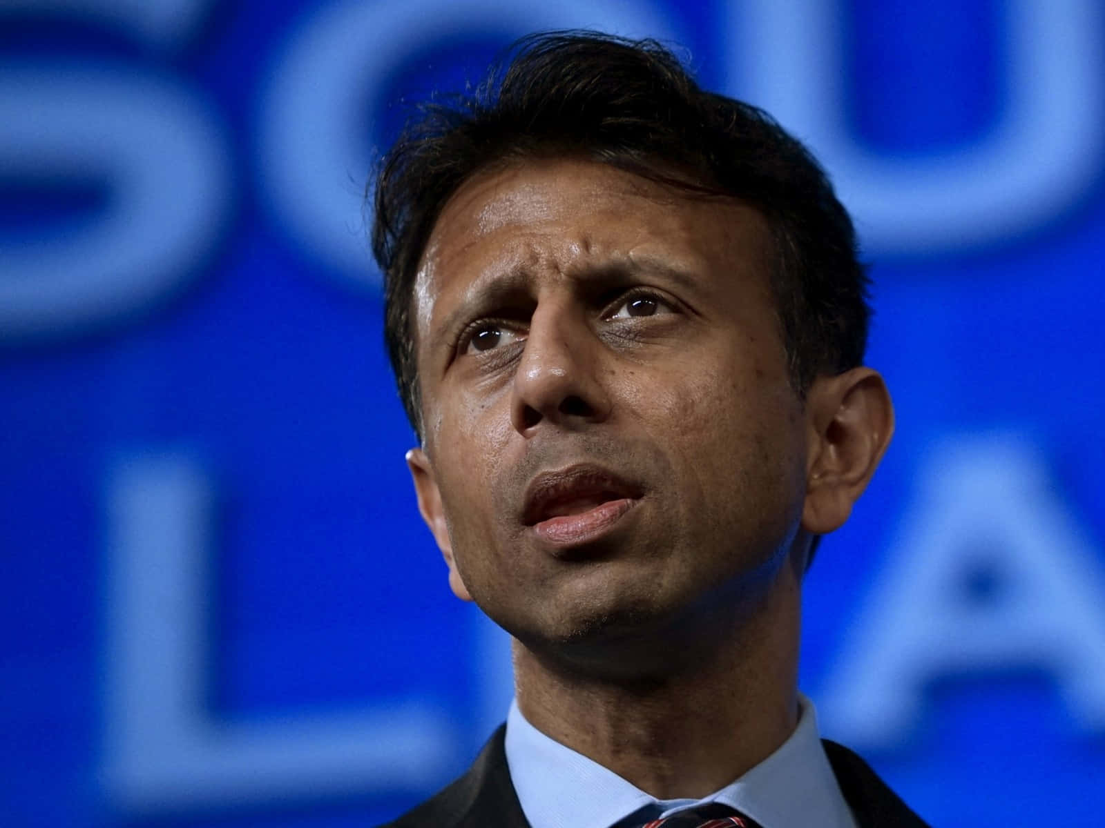 Bobby Jindal, suit, blue branded backdrop, HD Desktop Wallpaper