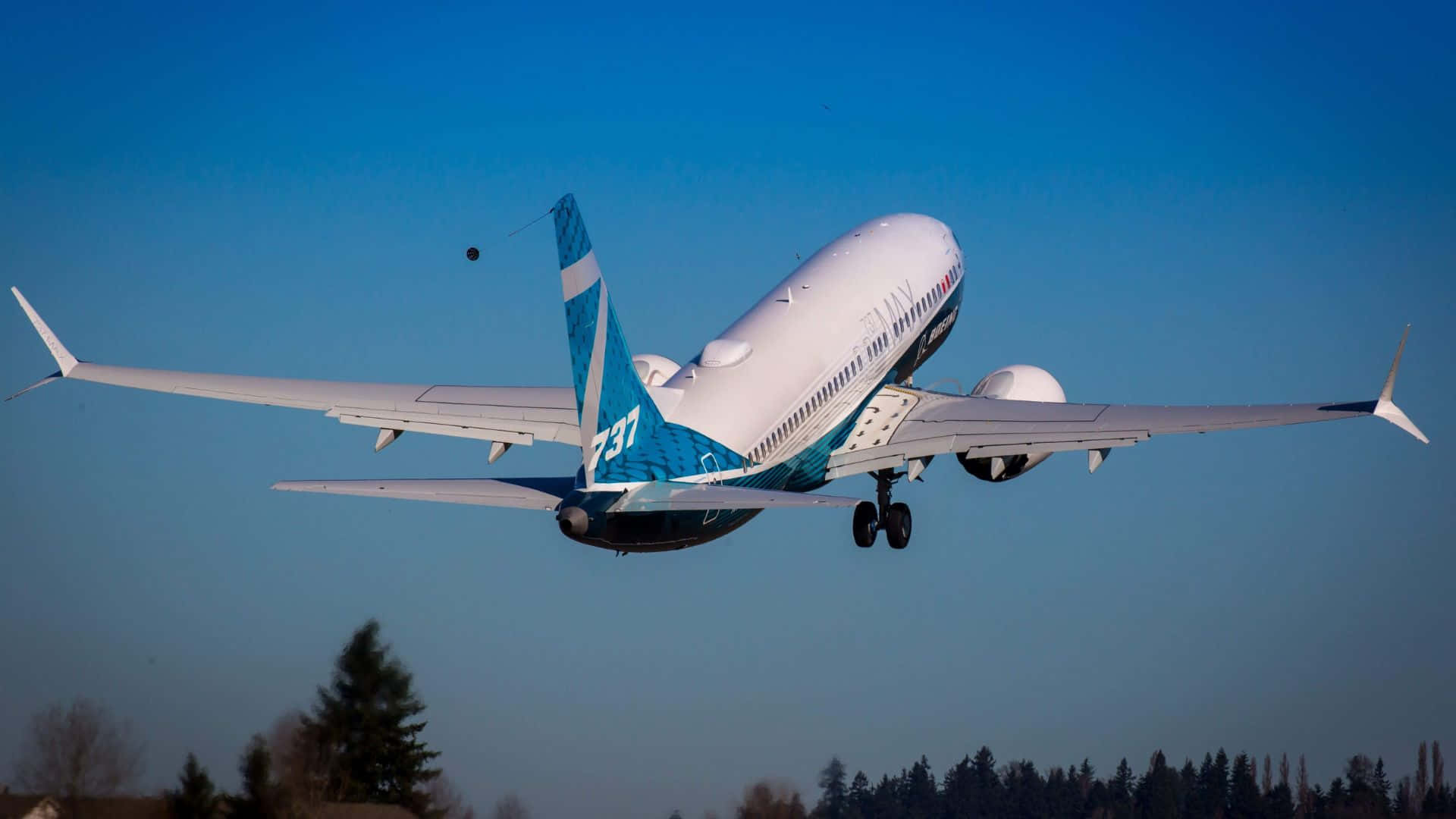 Boeing 737, white and teal livery, clear blue sky, Full HD Desktop Wallpaper
