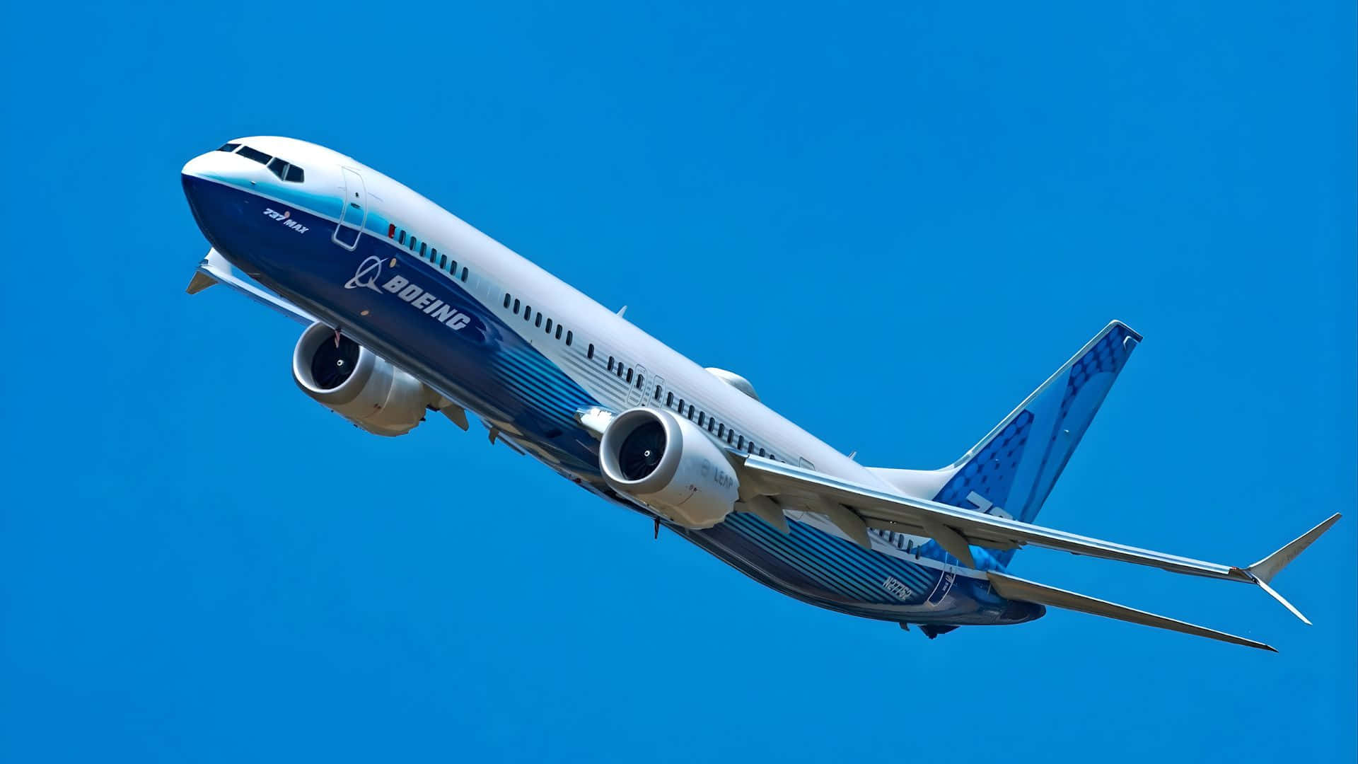 Boeing 737, clear blue sky, wings angled upward, Full HD Desktop Wallpaper