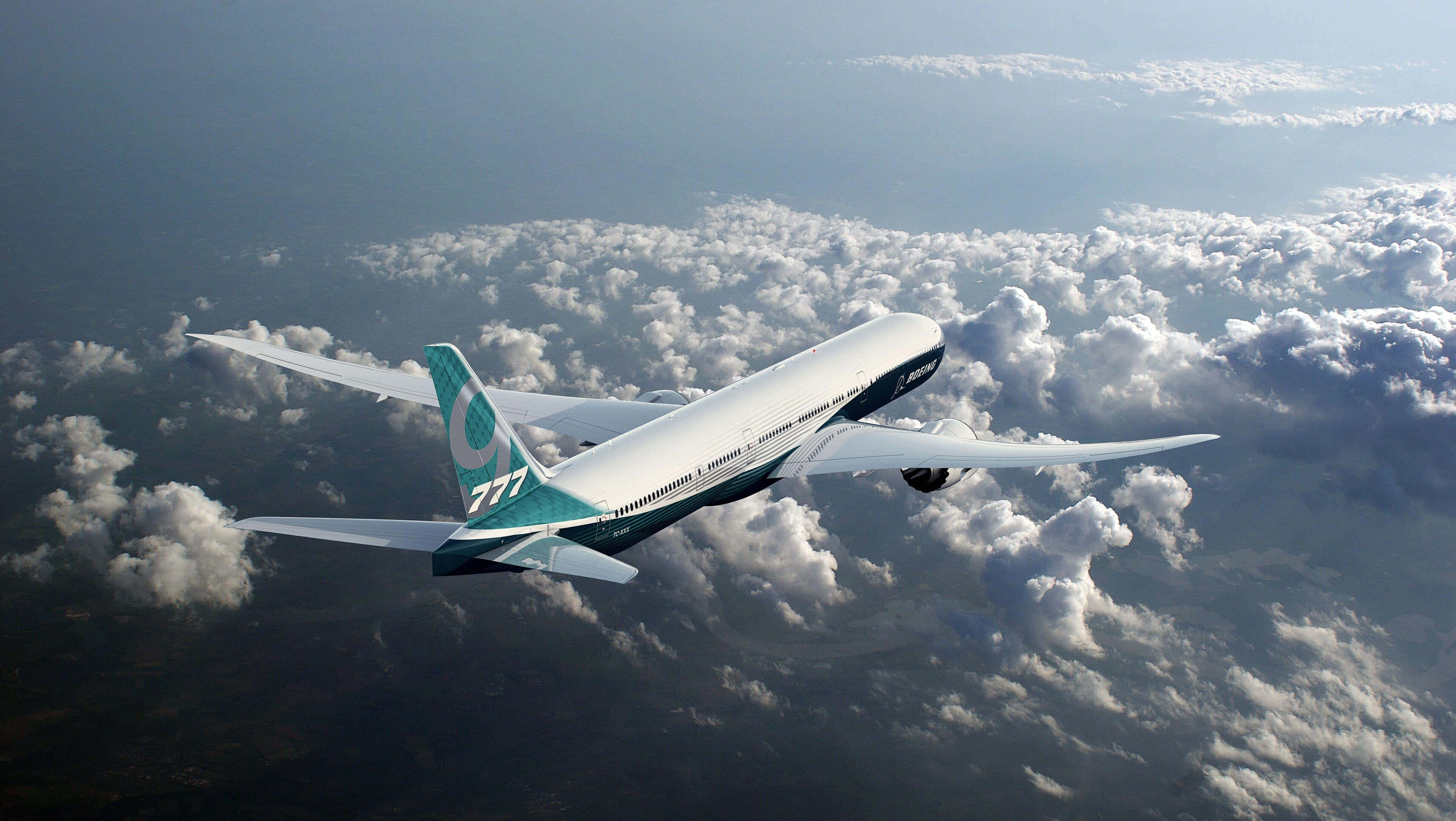 Boeing 777, fluffy white clouds, blue and white livery, 4K Desktop Wallpaper