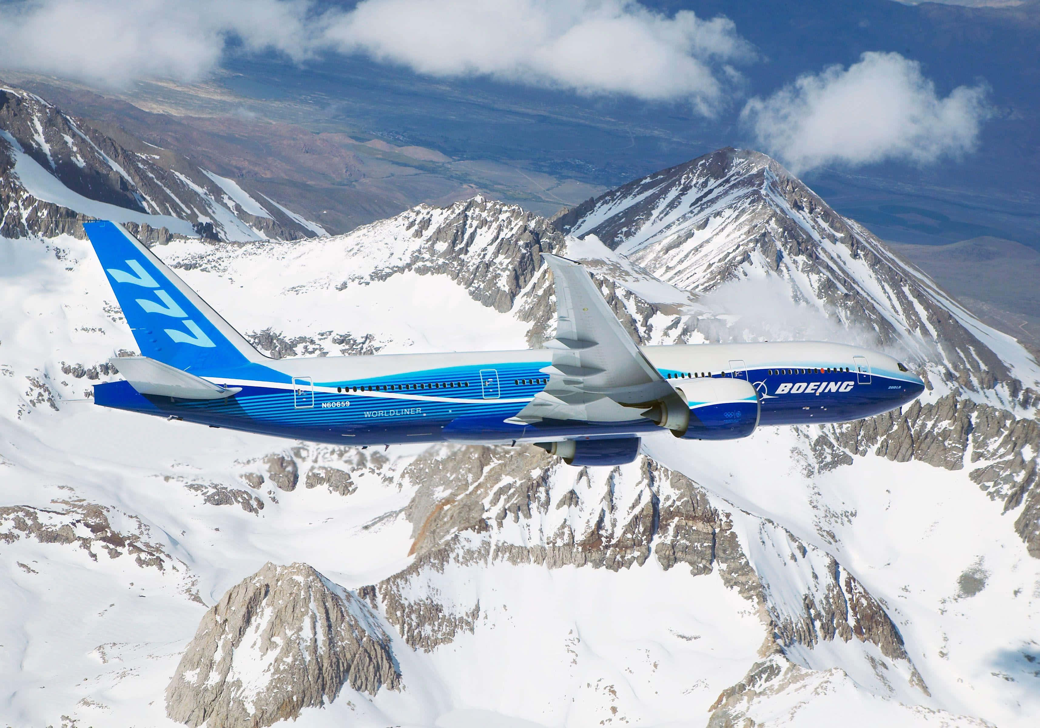 Boeing 777, mountain ranges, snow-capped mountain peaks, 2K Desktop Wallpaper