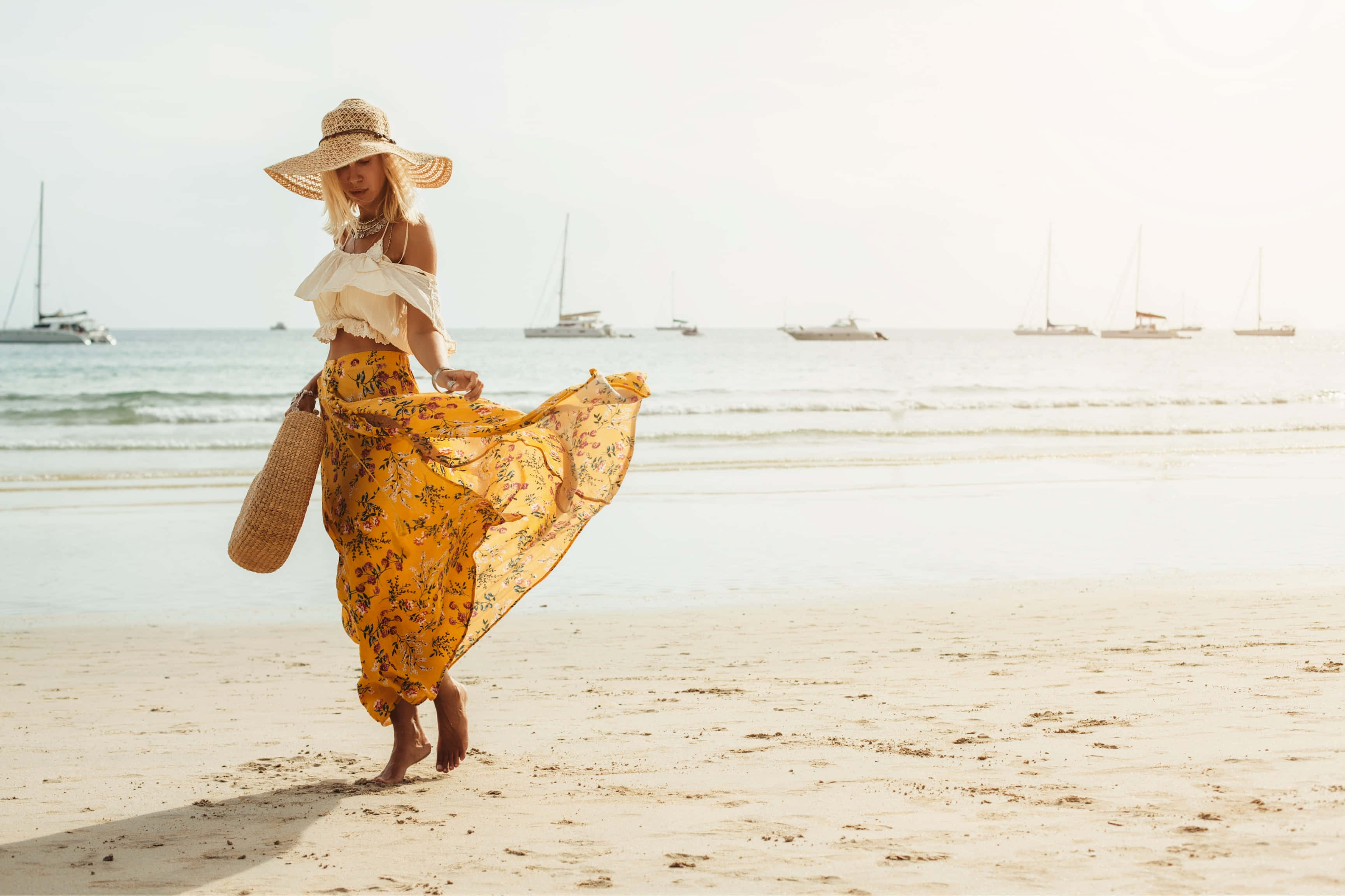 boho beach hippie style, yellow floral dress, wide-brimmed hat, 2K Desktop Wallpaper