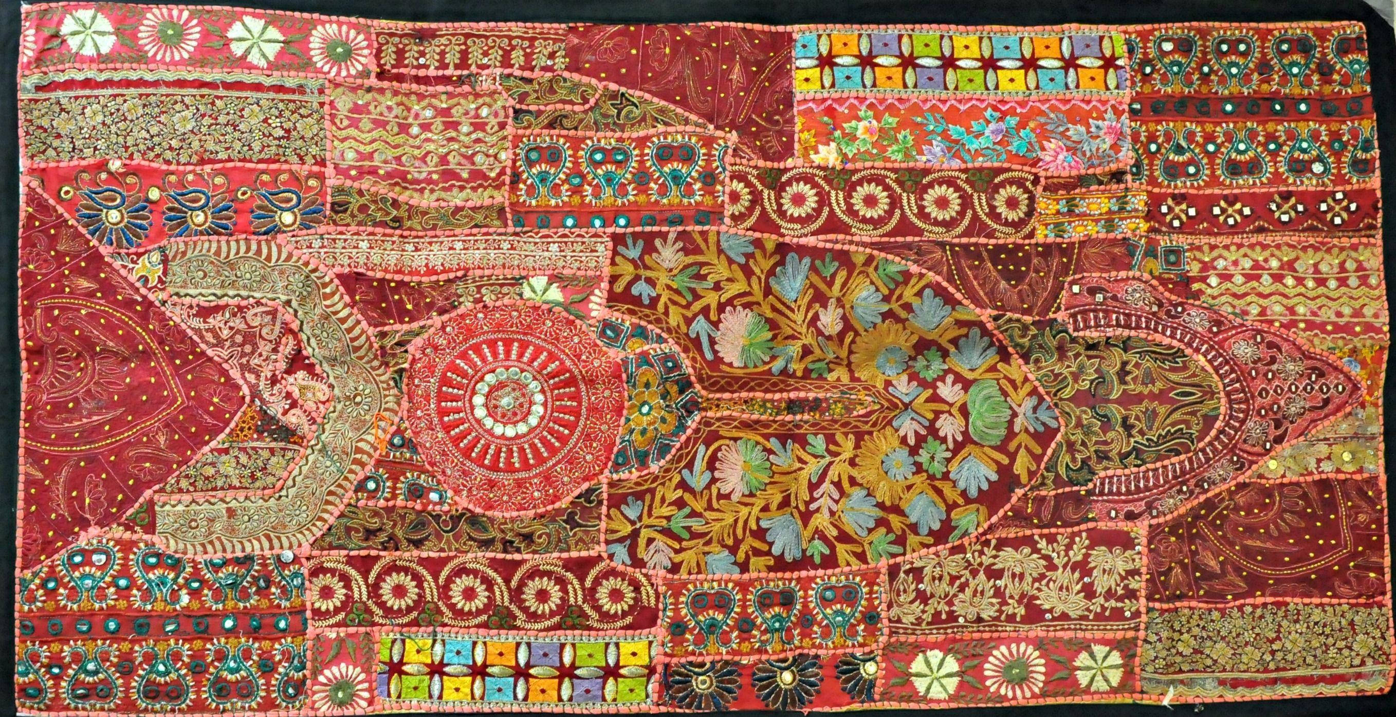 boho patterned carpet, vibrant patchwork textile quilt, intricate embroidery, 2K Desktop Wallpaper