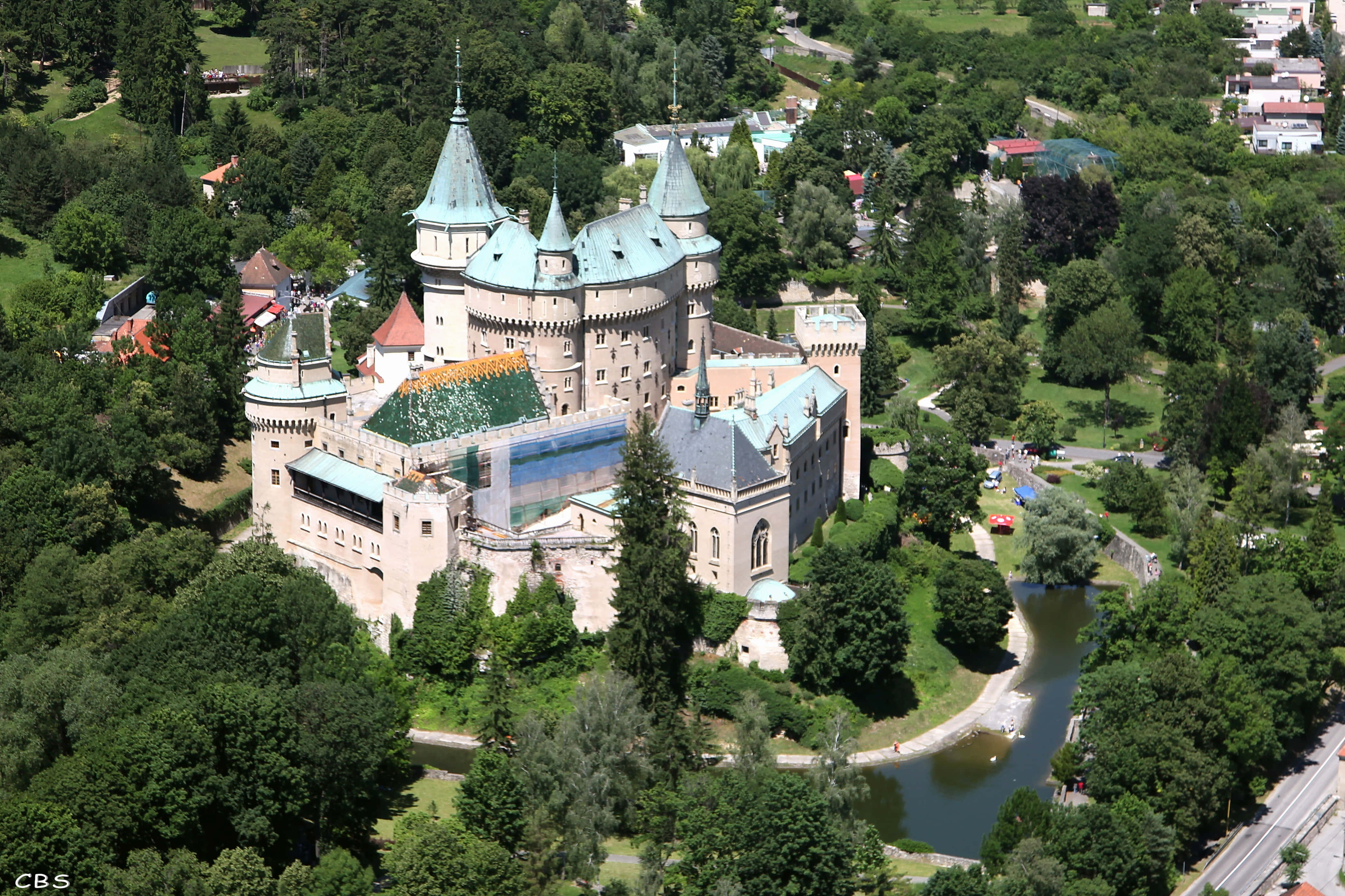 Bojnice Castle, teal roofs, lush green trees, 4K Desktop Wallpaper