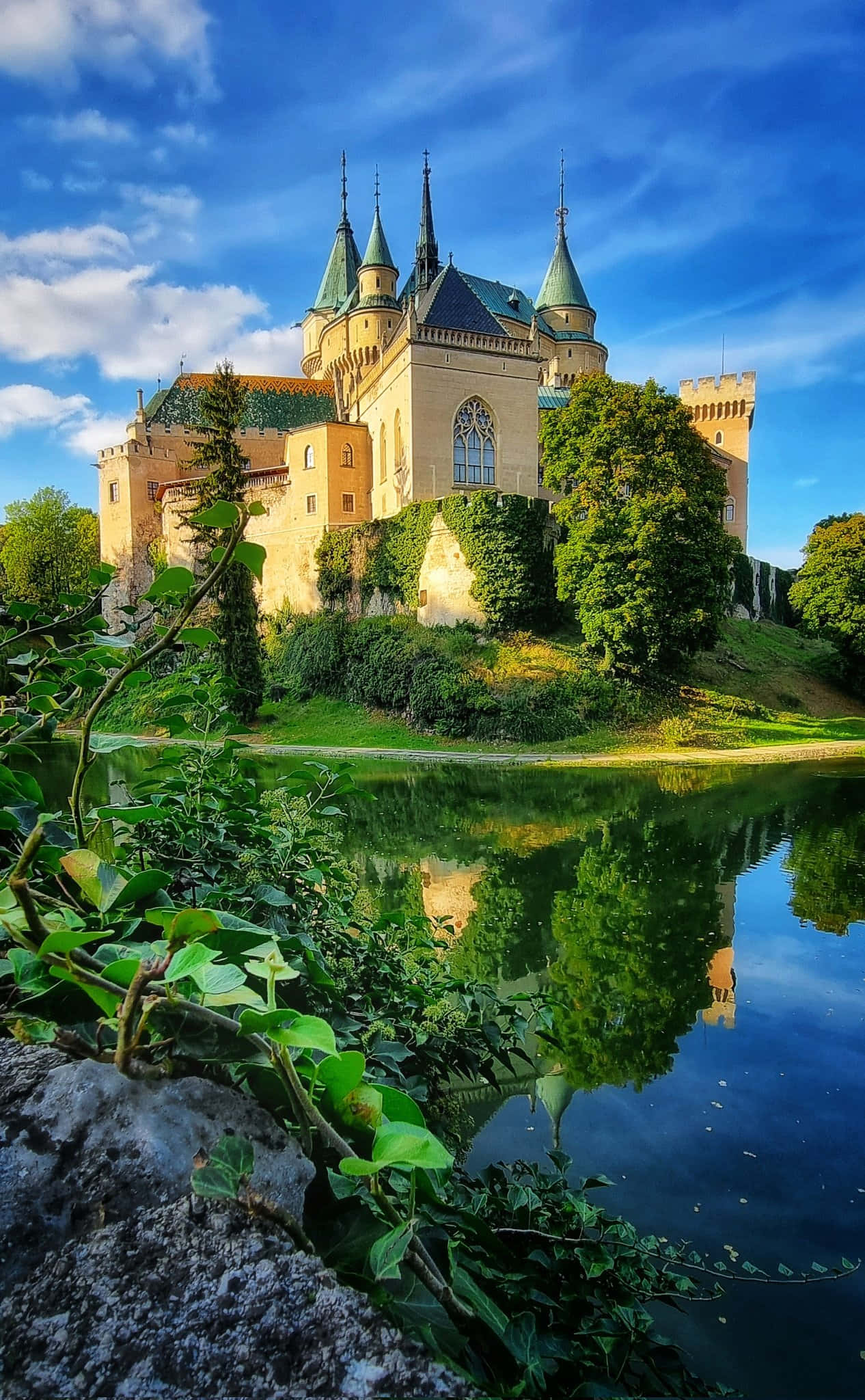 Bojnice Castle, green spires, calm lake, Full HD Phone Wallpaper