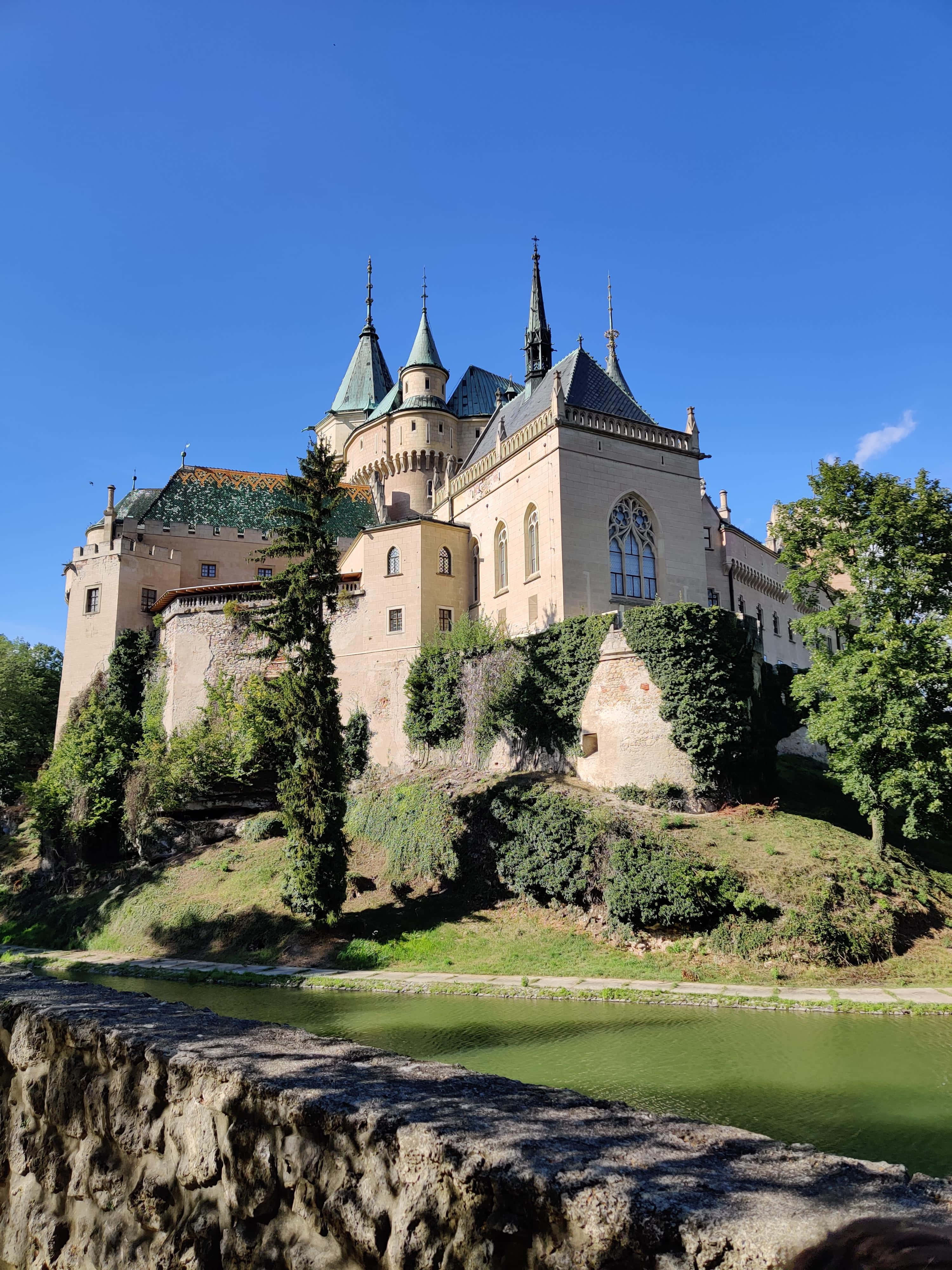 Bojnice Castle, stone wall, green roofs, 4K Phone Wallpaper