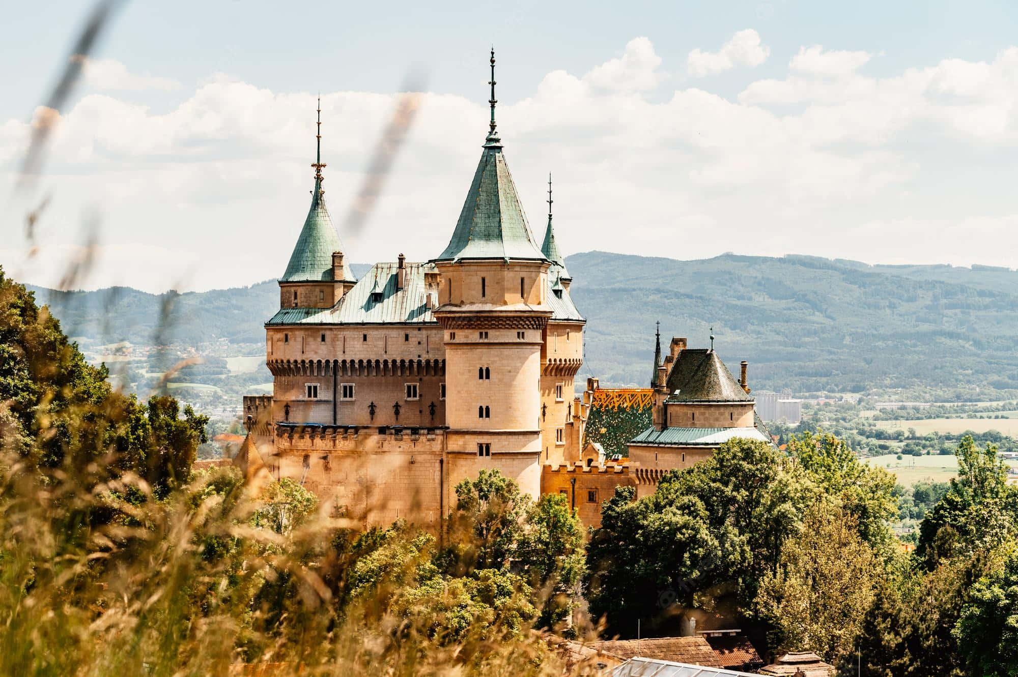 Bojnice Castle, green spires, lush forests, Full HD Desktop Wallpaper