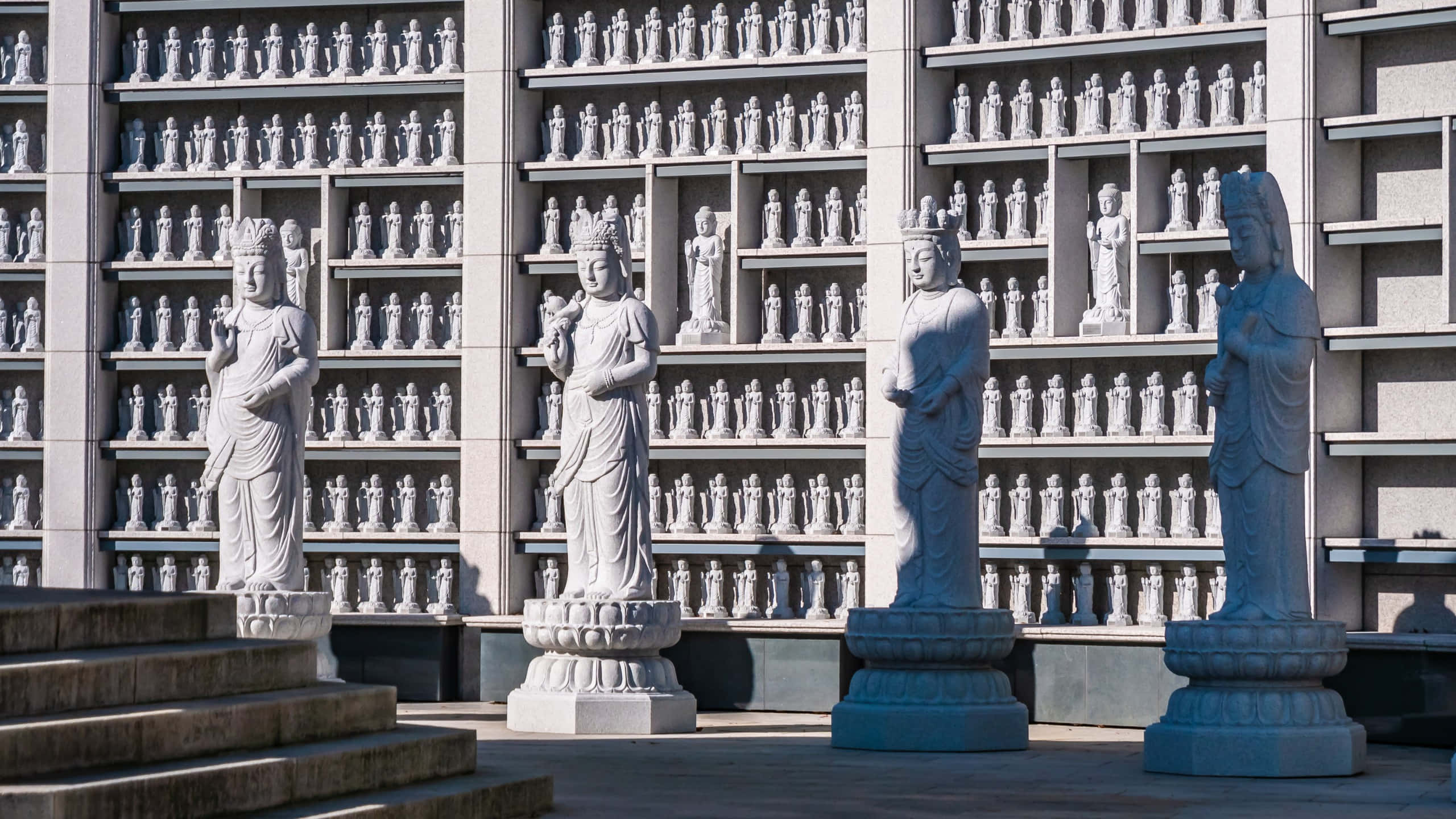 Bongeunsa Temple, stone statues, serene Buddhist figures, 2K Desktop Wallpaper