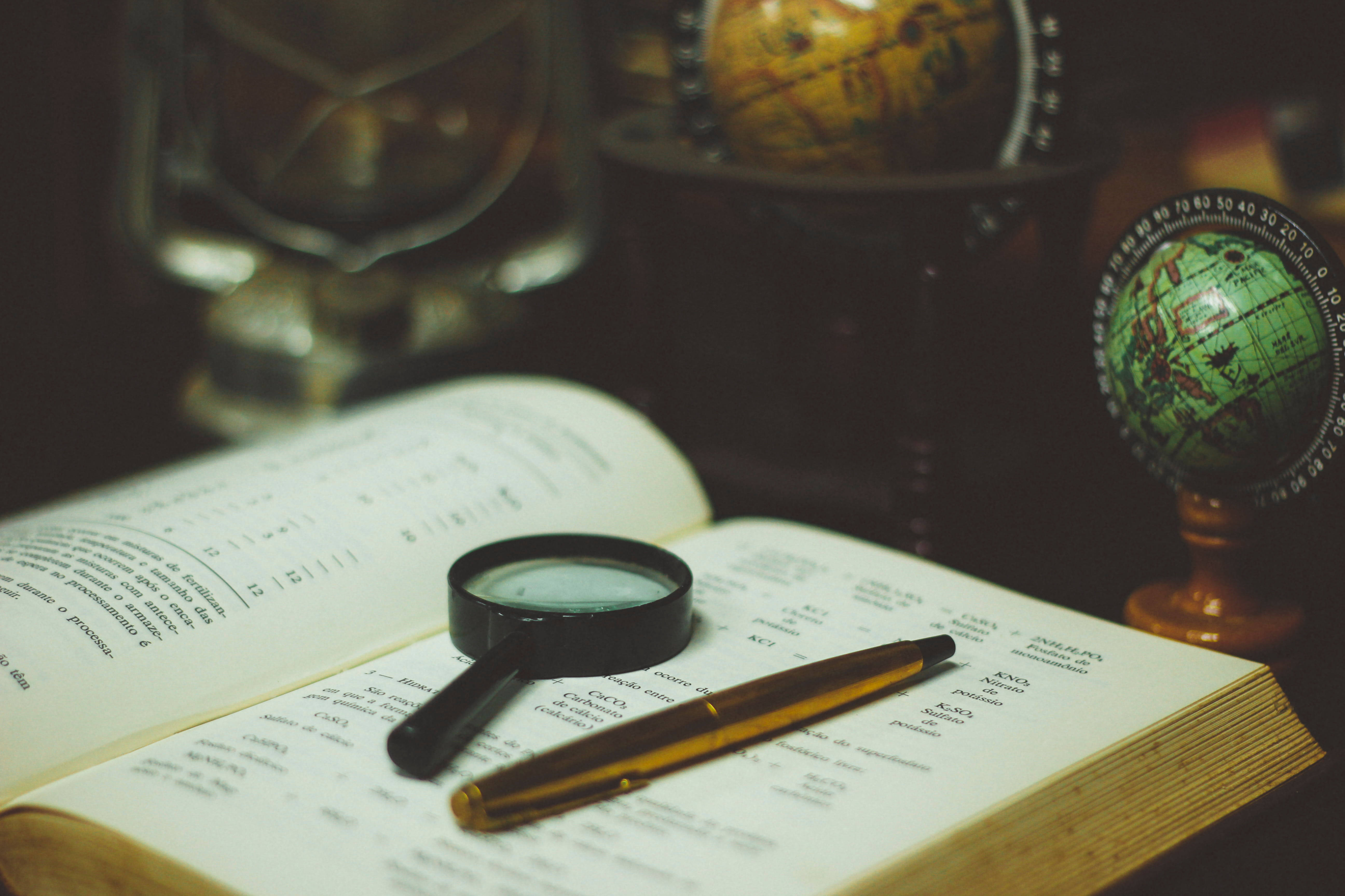reference book, magnifying glass, pen, 5K Desktop Wallpaper