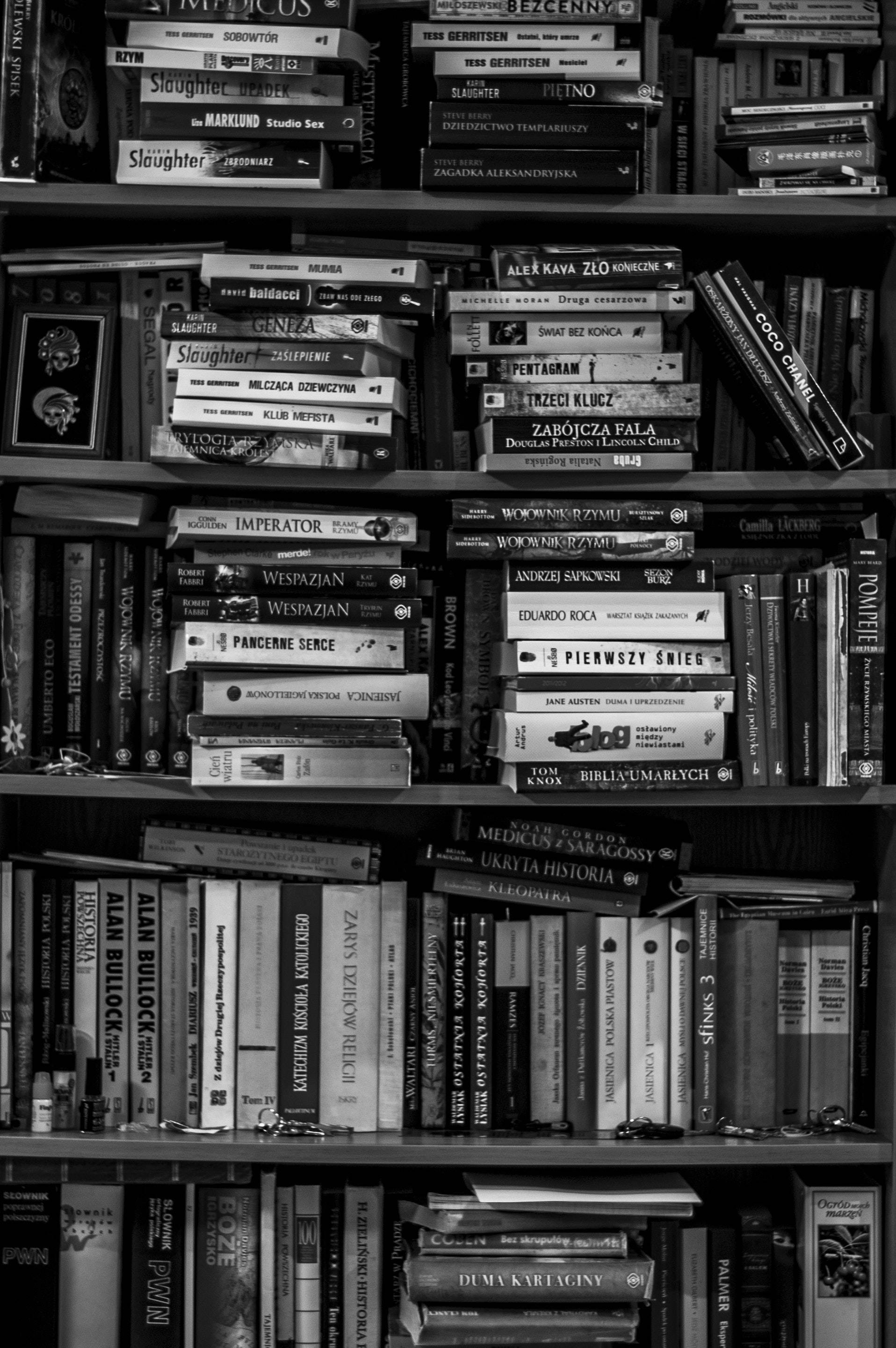 black and white photography books, bookshelves, Polish titles, 2K Phone Wallpaper