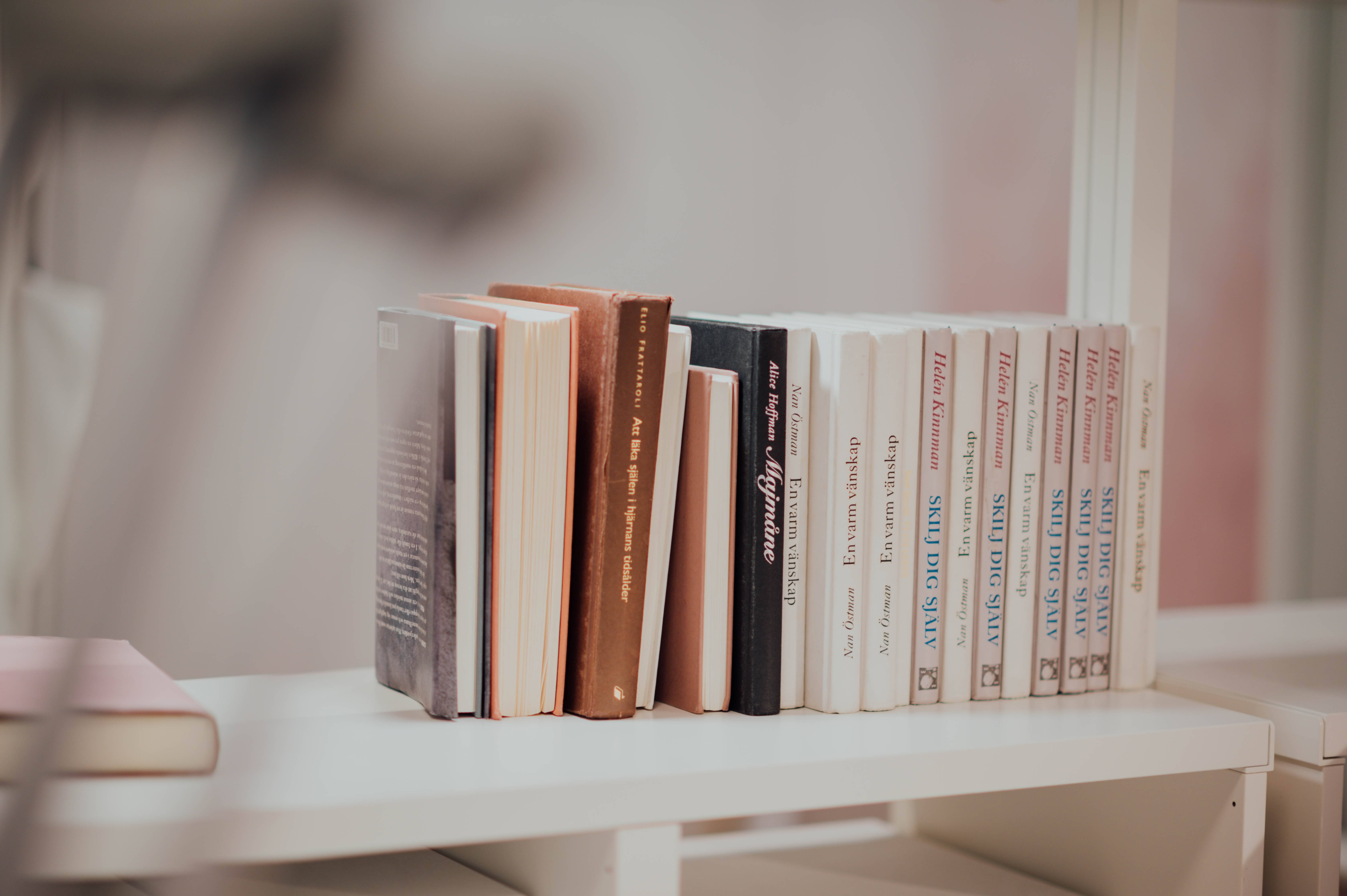 white shelf, softly lit room, blurred background elements, 5K Desktop Wallpaper