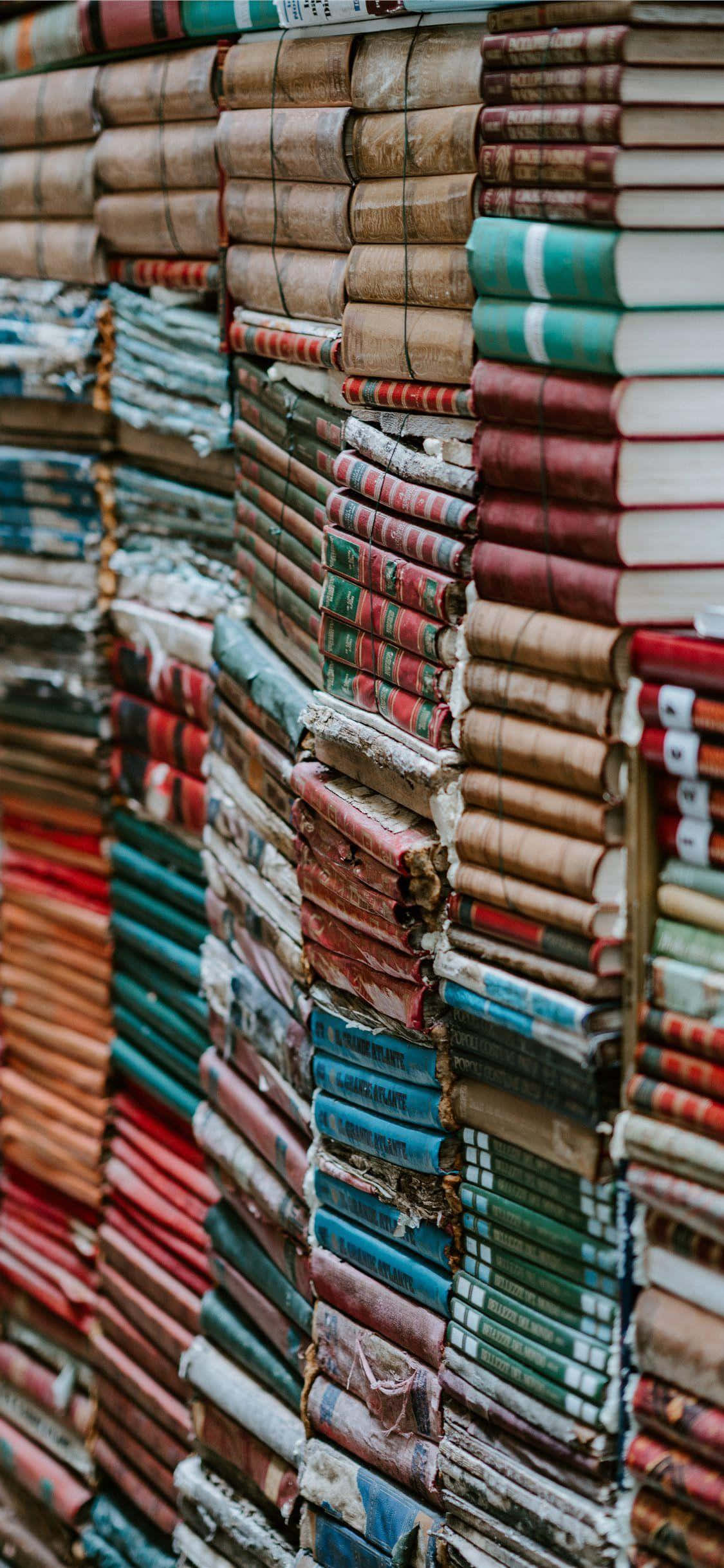 Books iPhone, vintage books, worn colorful spines, Full HD Phone Wallpaper