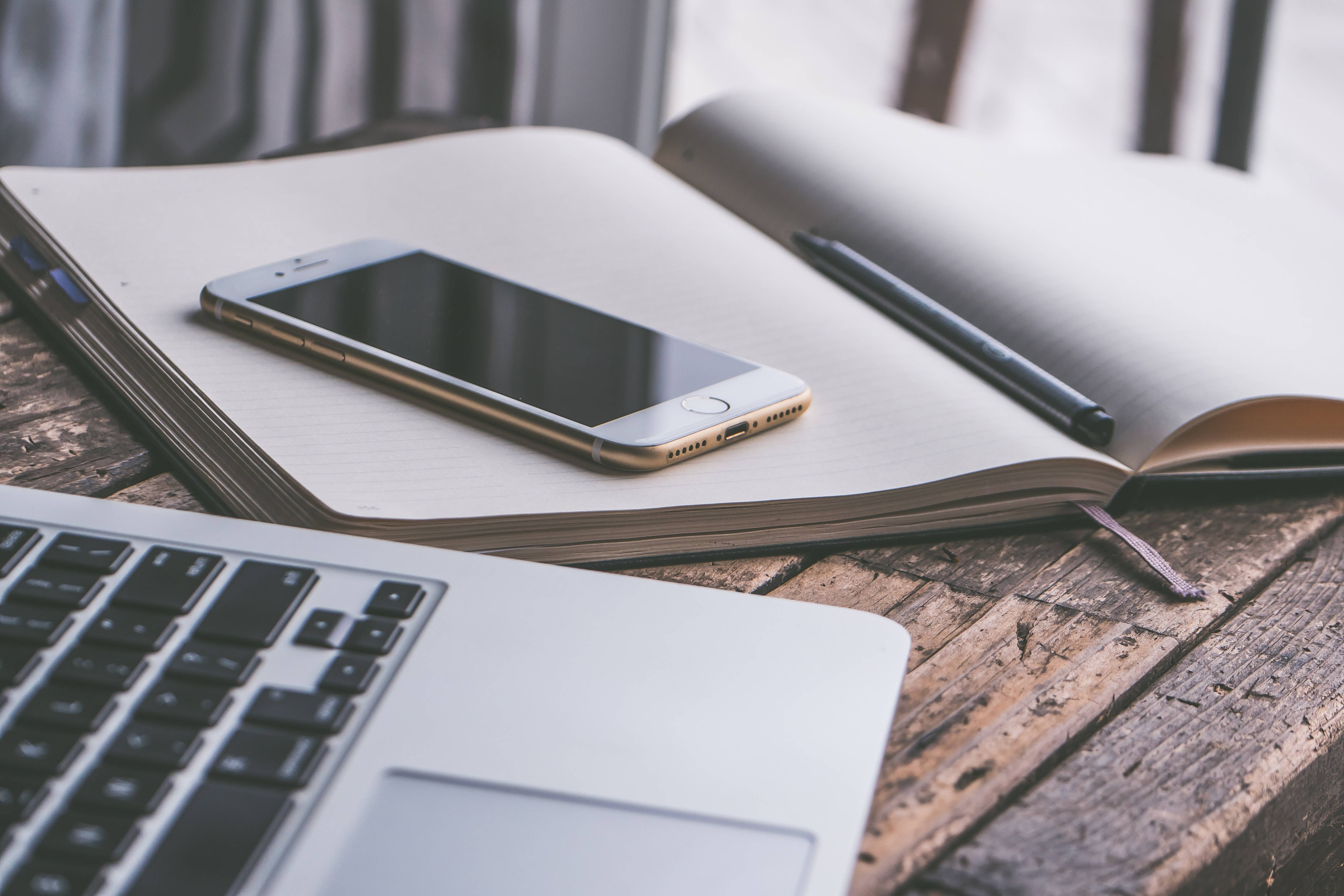 iPhone, rustic wooden desk, notebook, 4K Desktop Wallpaper