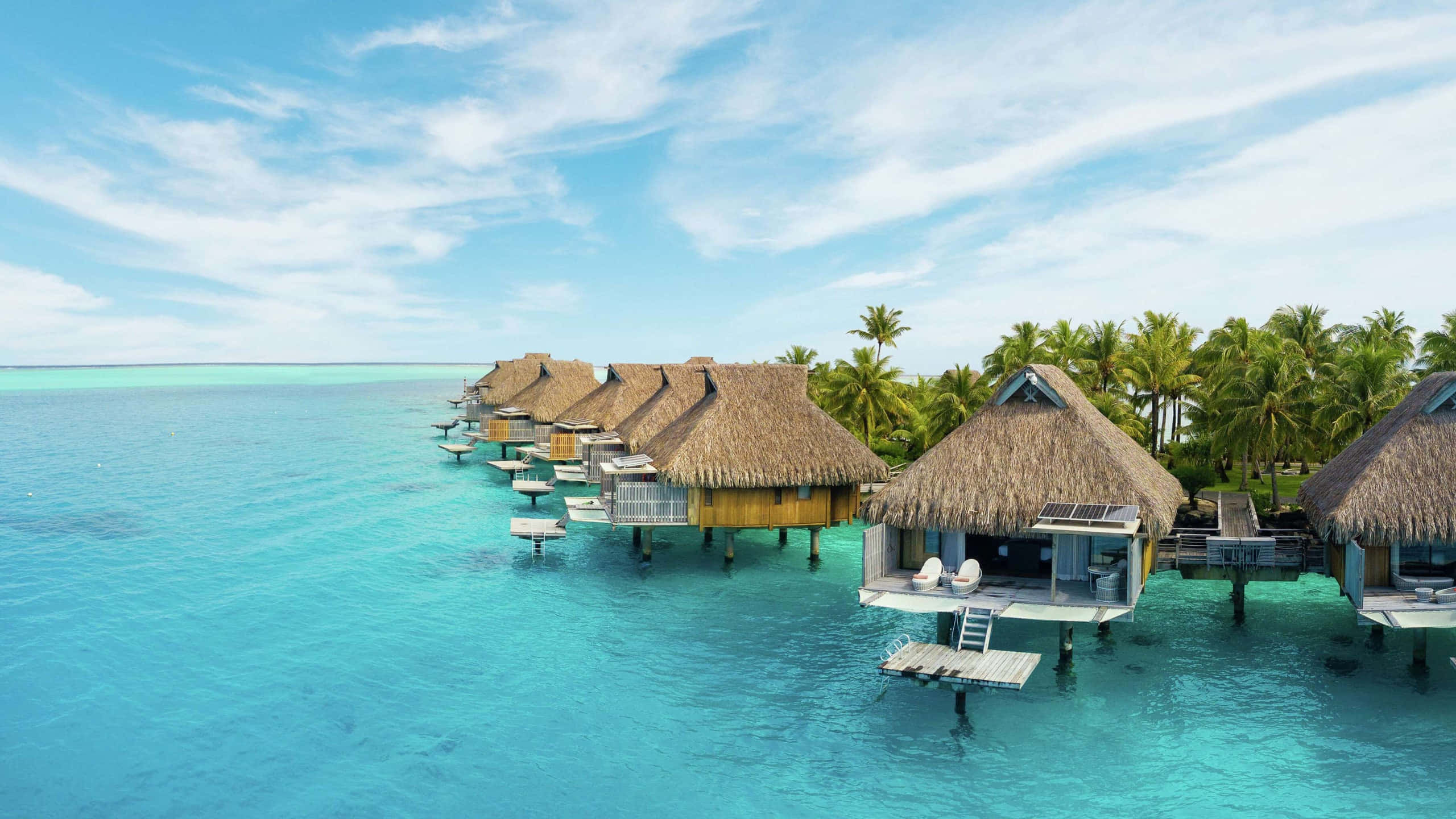 Bora Bora Beach, overwater bungalows, thatched roofs, 2K Desktop Wallpaper