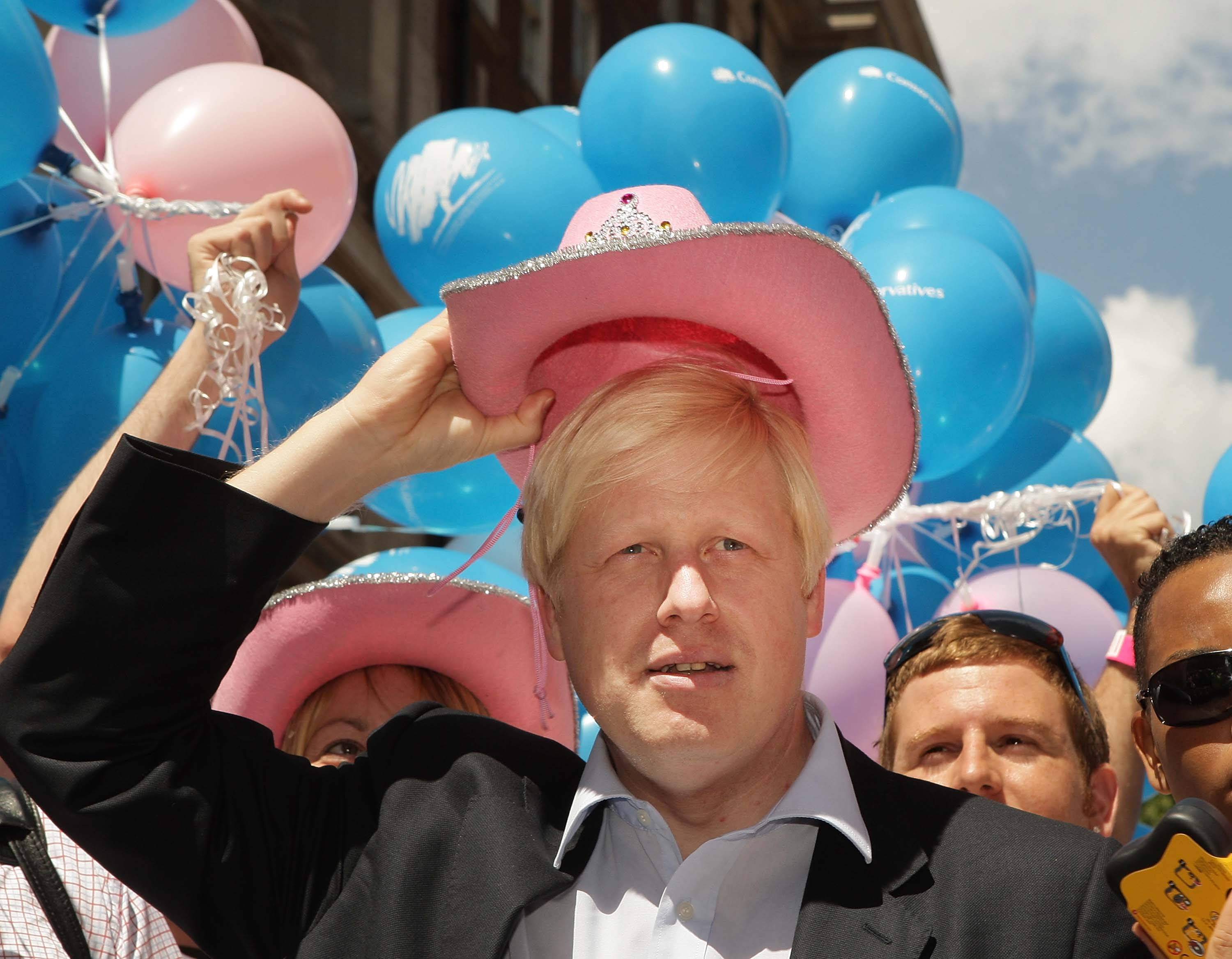 Boris Johnson, pink cowboy hat, blue balloons, 2K Desktop Wallpaper