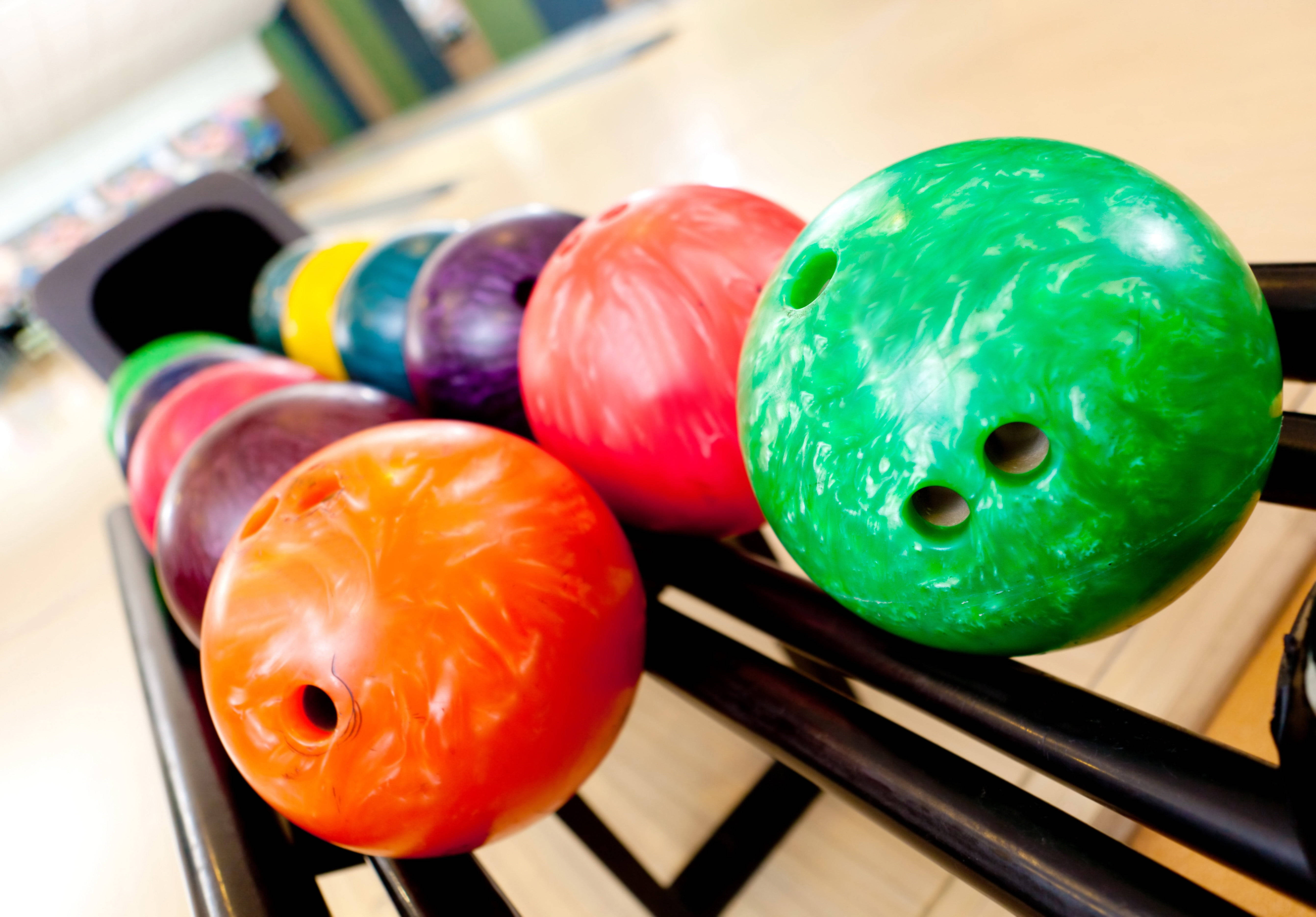 colorful bowling balls, glossy swirl patterns, finger holes, 5K Desktop Wallpaper