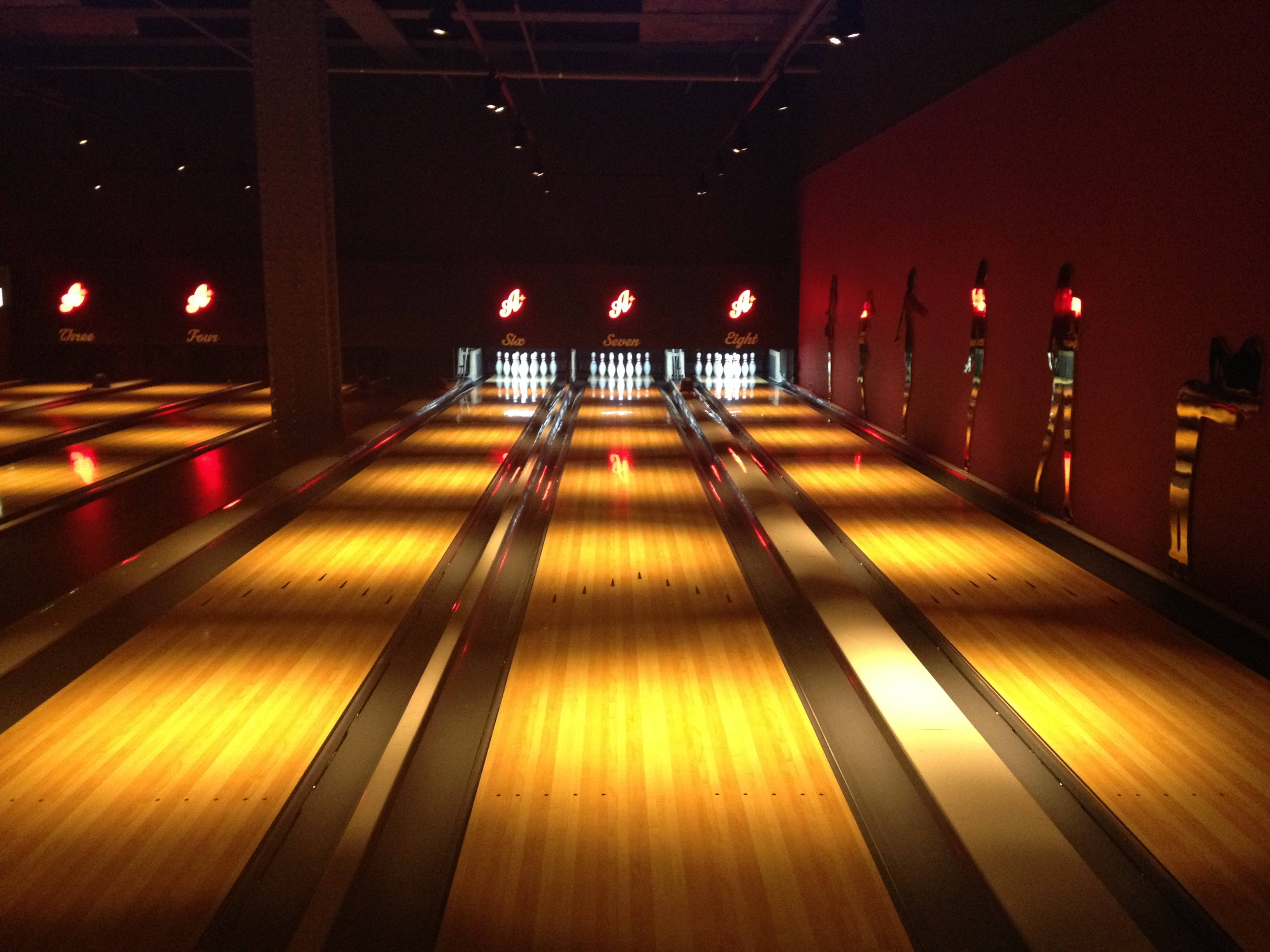 Dim Bowling Alley, bowling lanes, glowing red lane markers, 2K Desktop Wallpaper