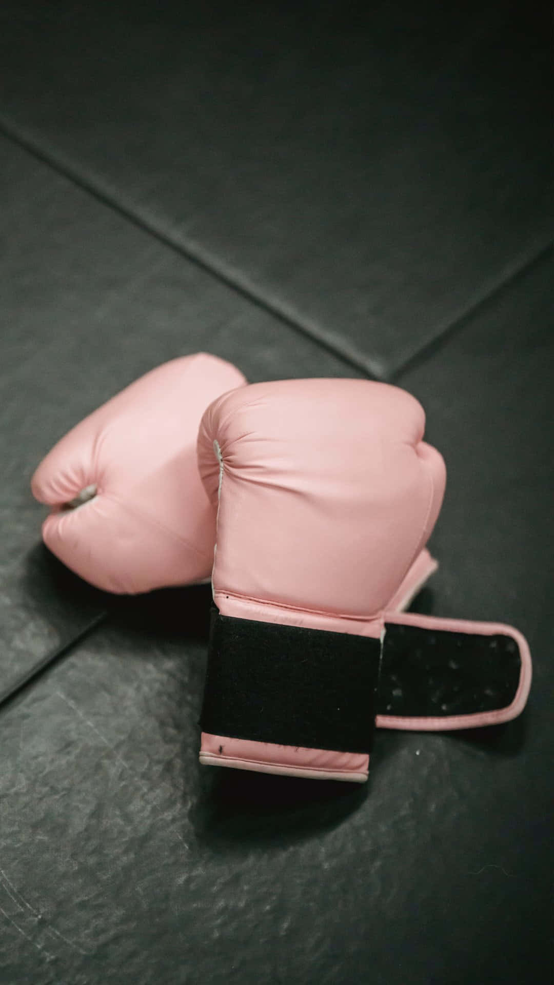 pink boxing gloves, black wrist straps, dark gray gym mat, Full HD Phone Wallpaper