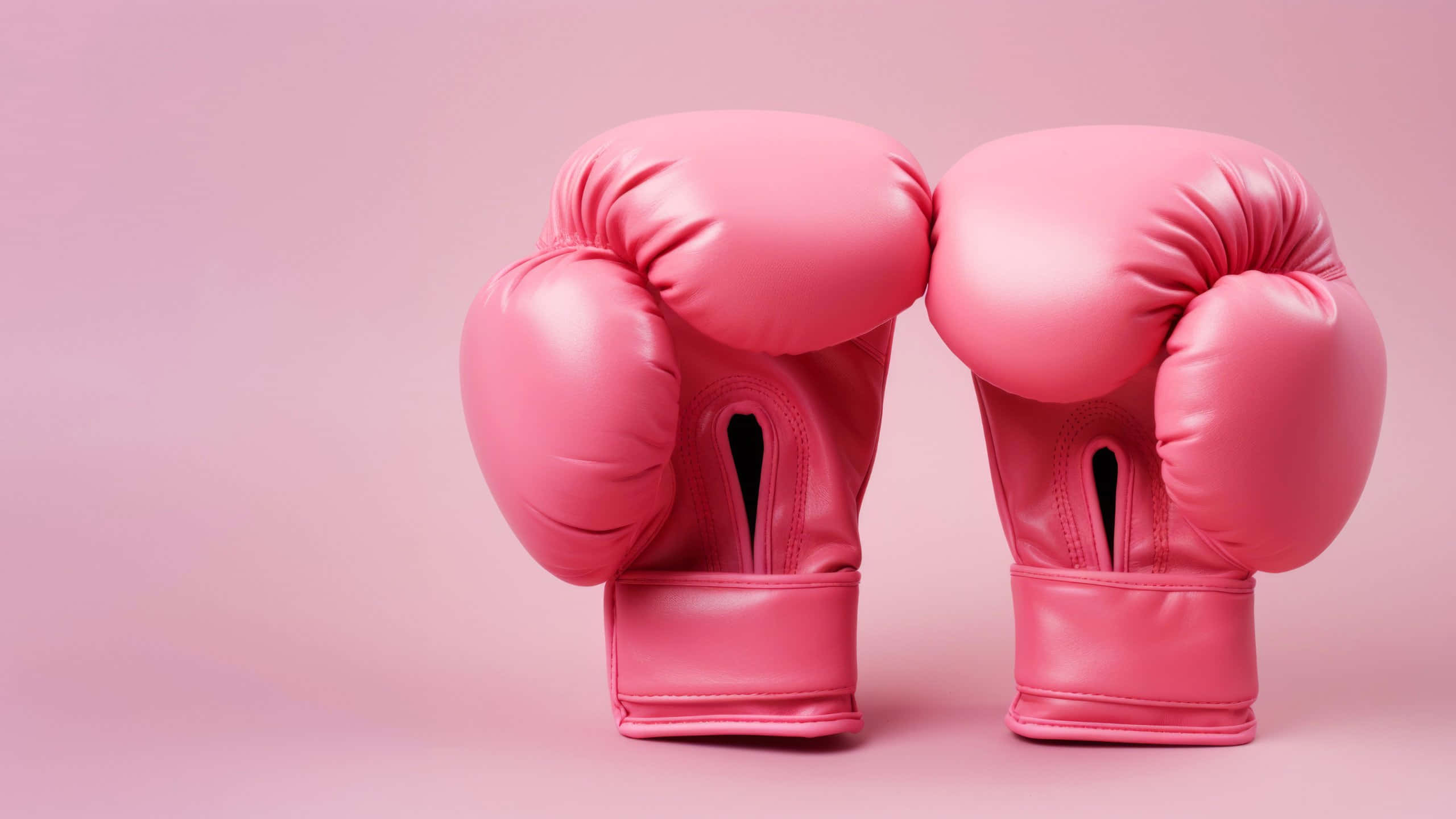 pink boxing gloves, glossy, soft pink background, 2K Desktop Wallpaper