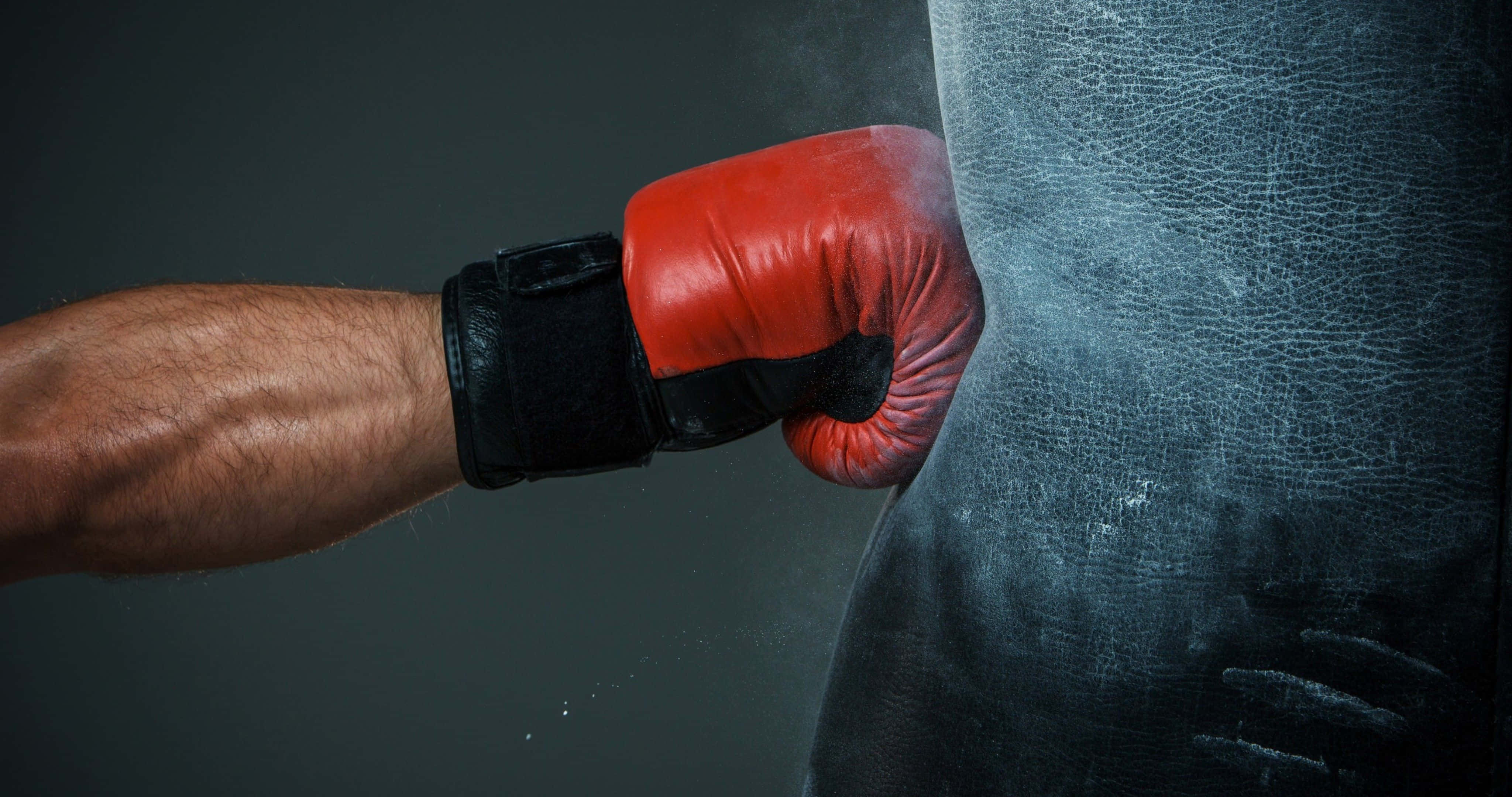 red boxing glove, worn black leather punching bag, dust flying, 4K Desktop Wallpaper