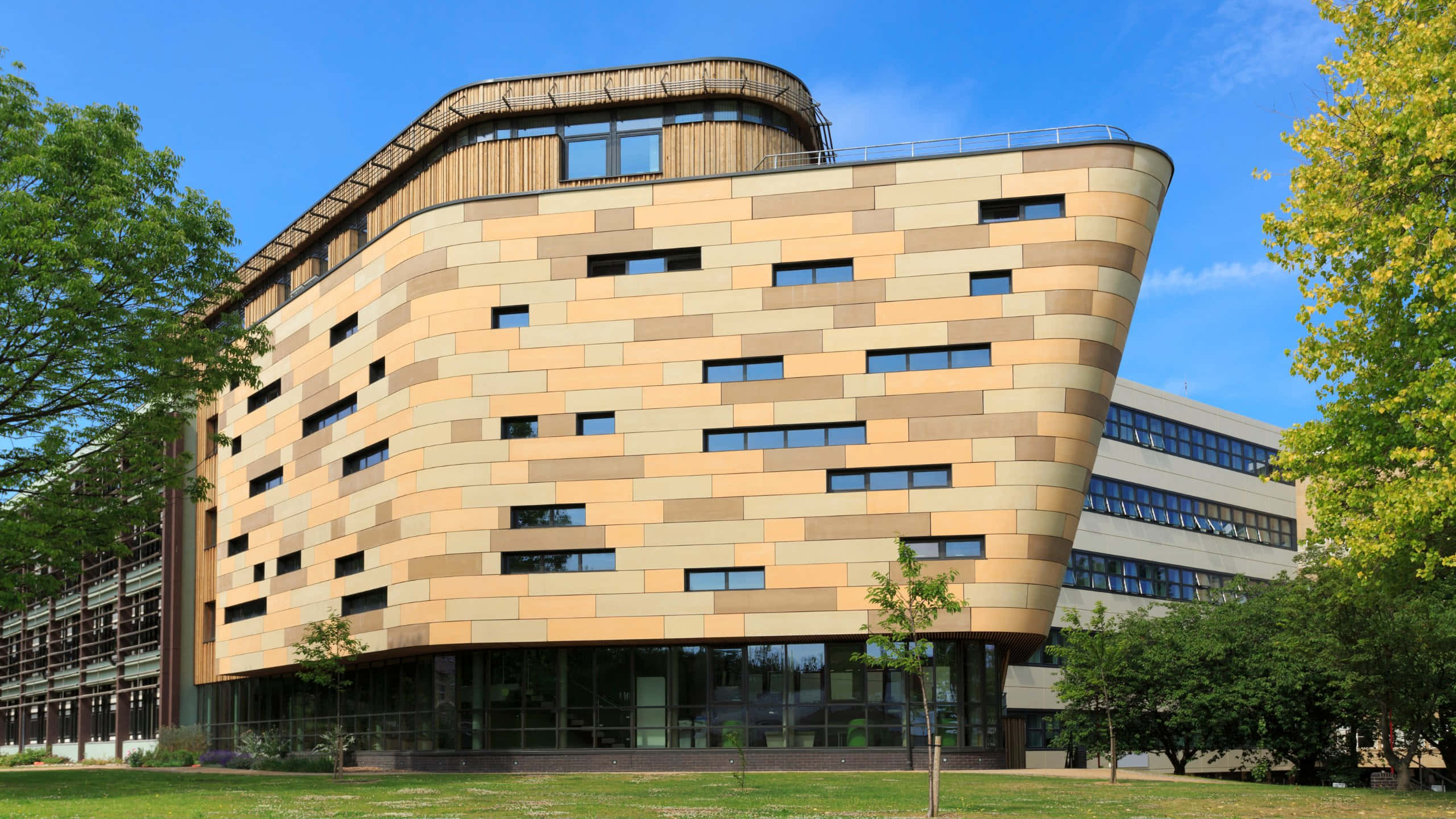 modern university building, Bradford U K, beige stone panels, 2K Desktop Wallpaper
