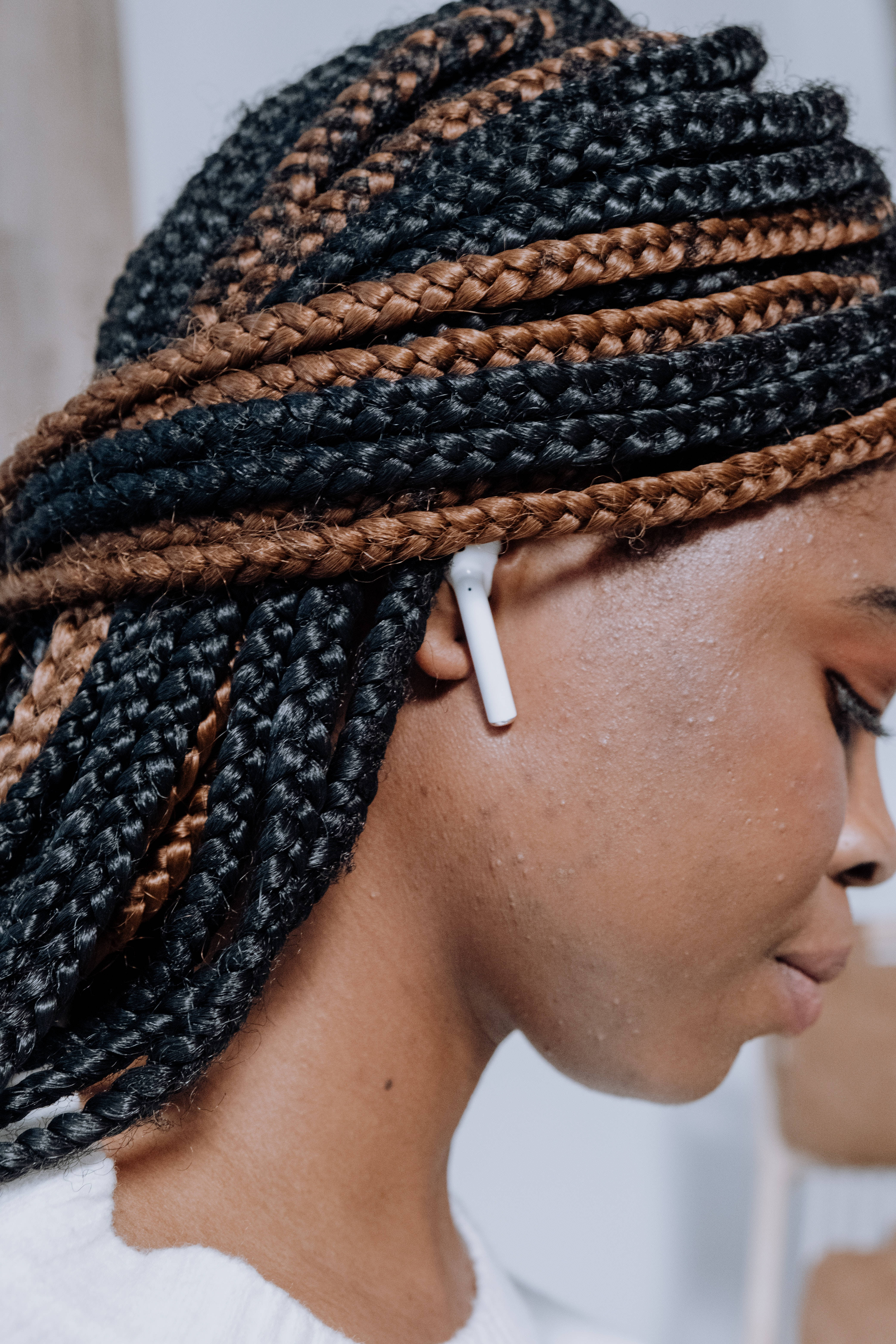black and brown braided hair, white wireless earbuds, profile, 5K Phone Wallpaper